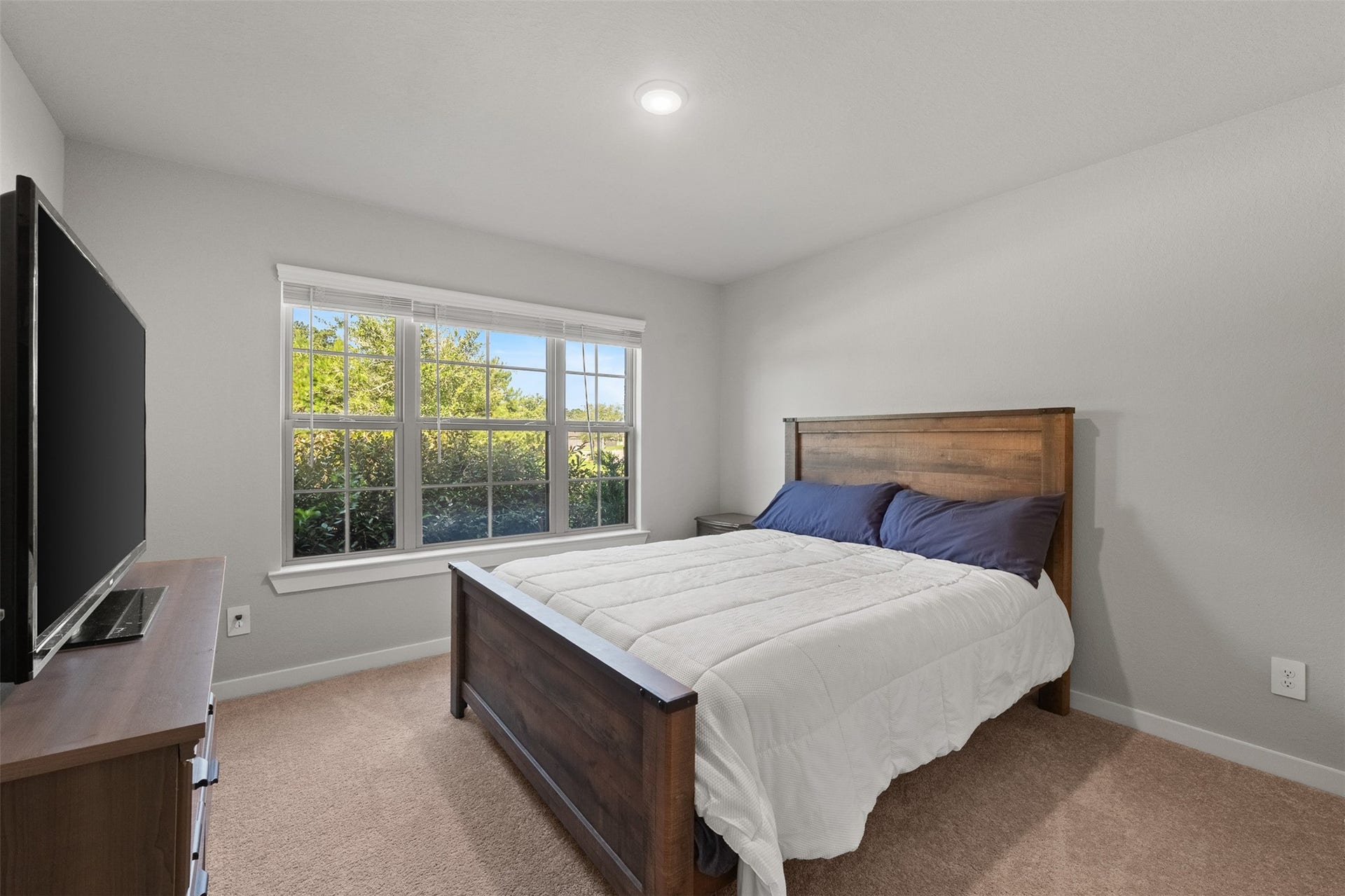 17707 Sapphire Pines Drive, New Caney, TX 77357 Guest room #1 located in the front of the home