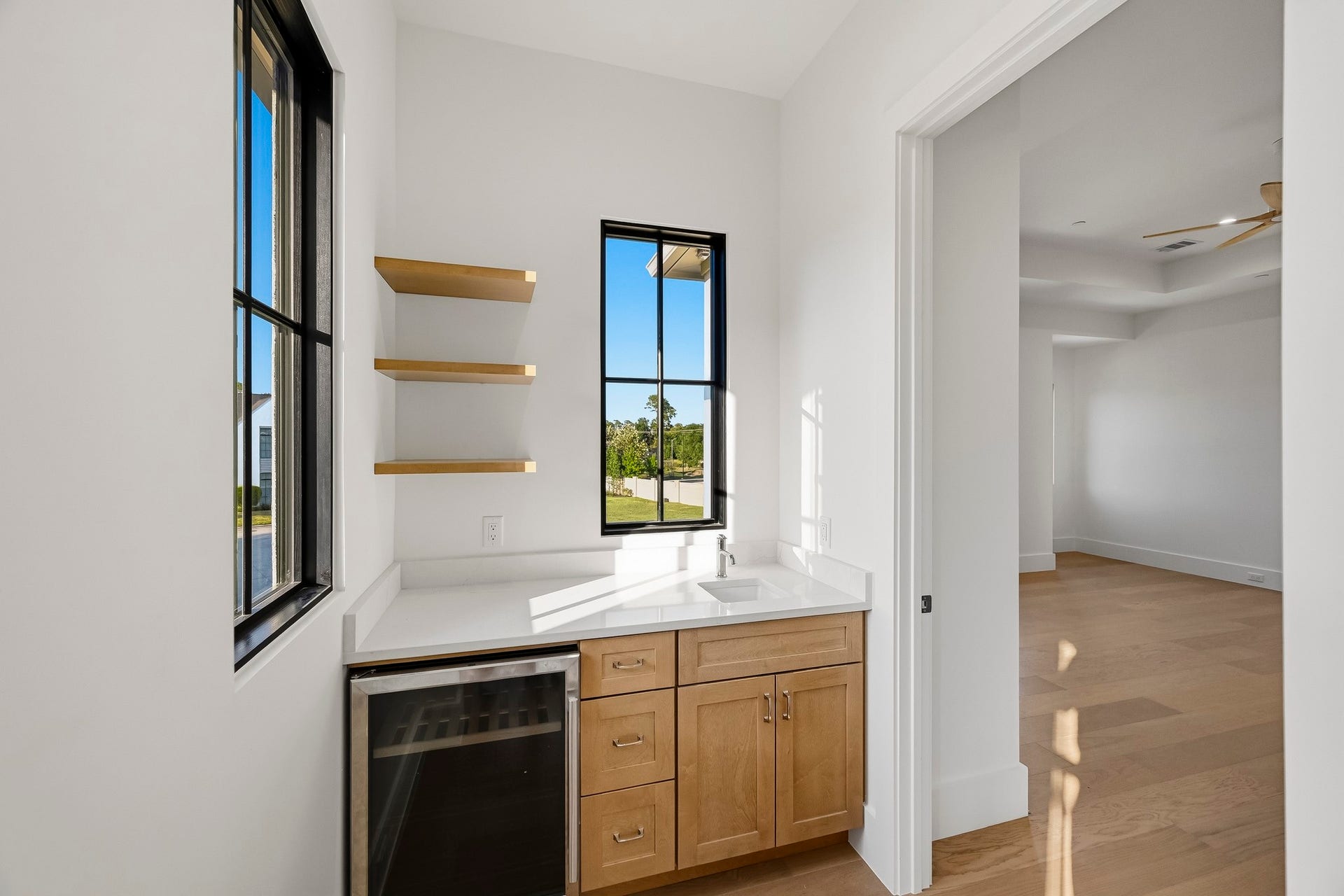 The coffee / beverage bar offers access to your master suite!