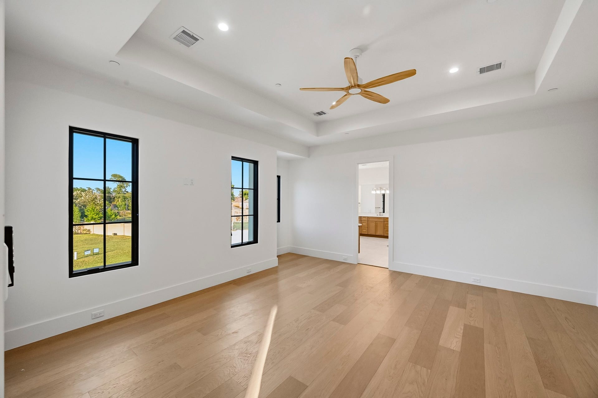 The stunning master bedroom looks over the entire community!