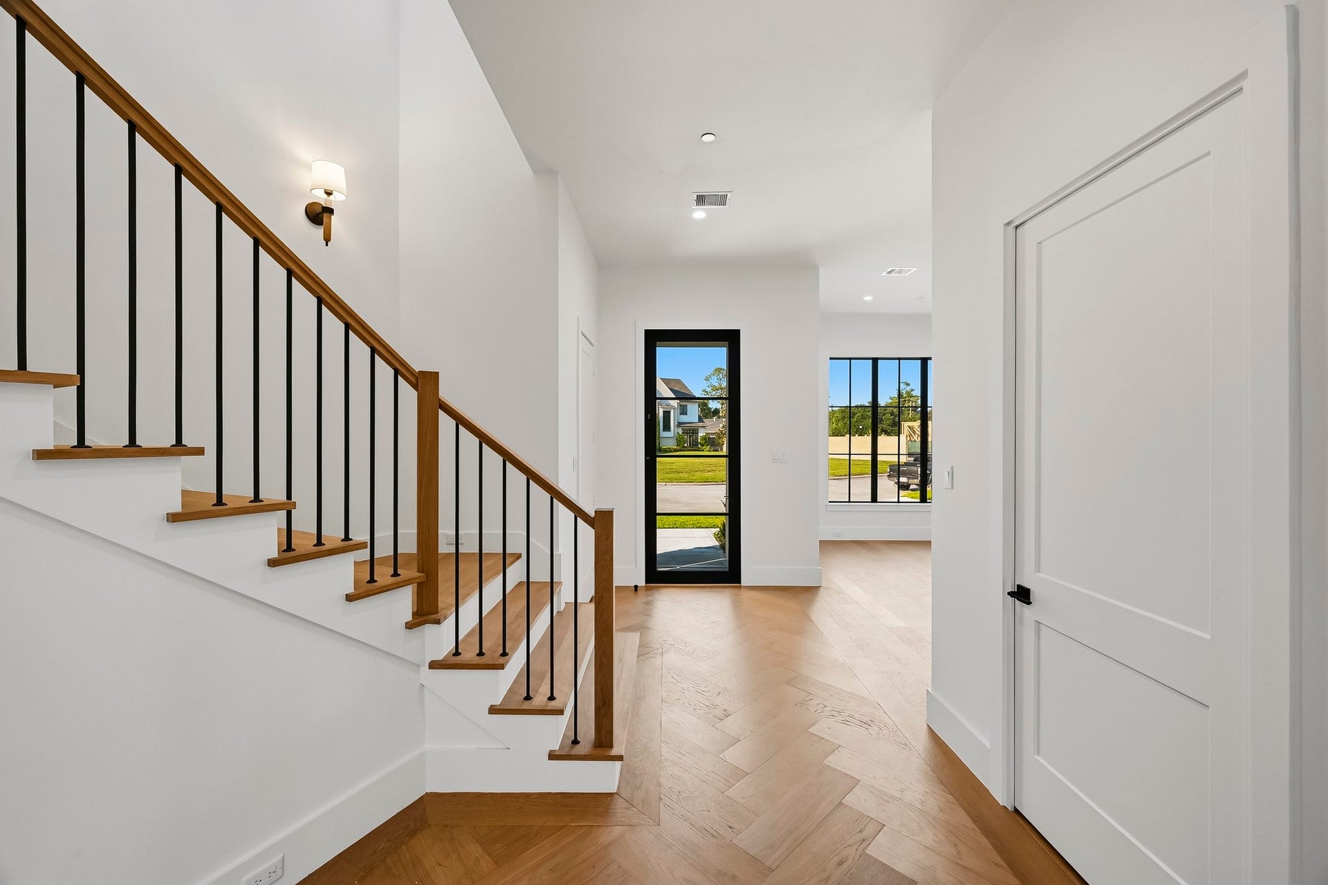 One last look at the herringbone foyer before heading upstairs!