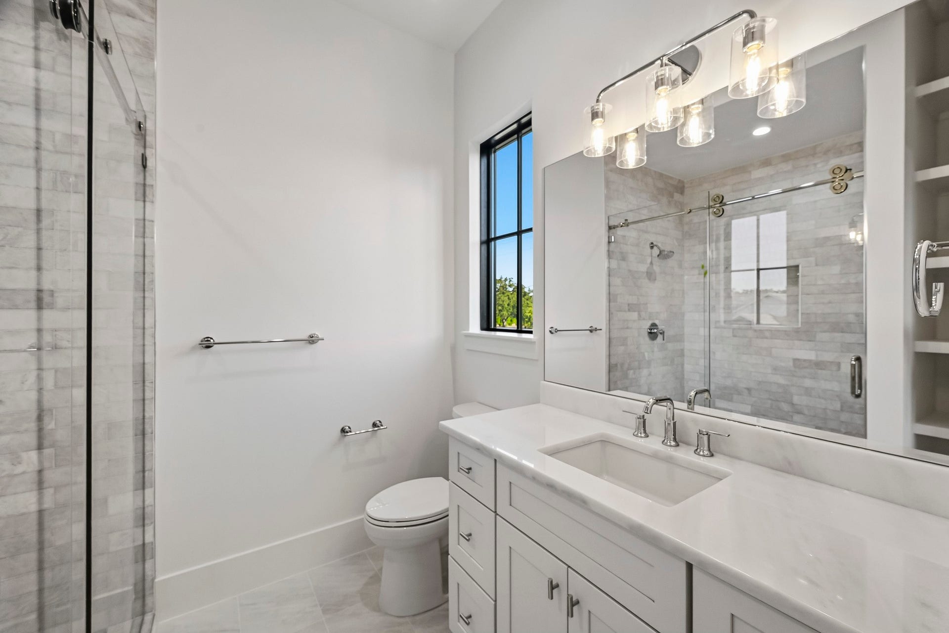 The final bathroom offers a spacious walk-in shower!
