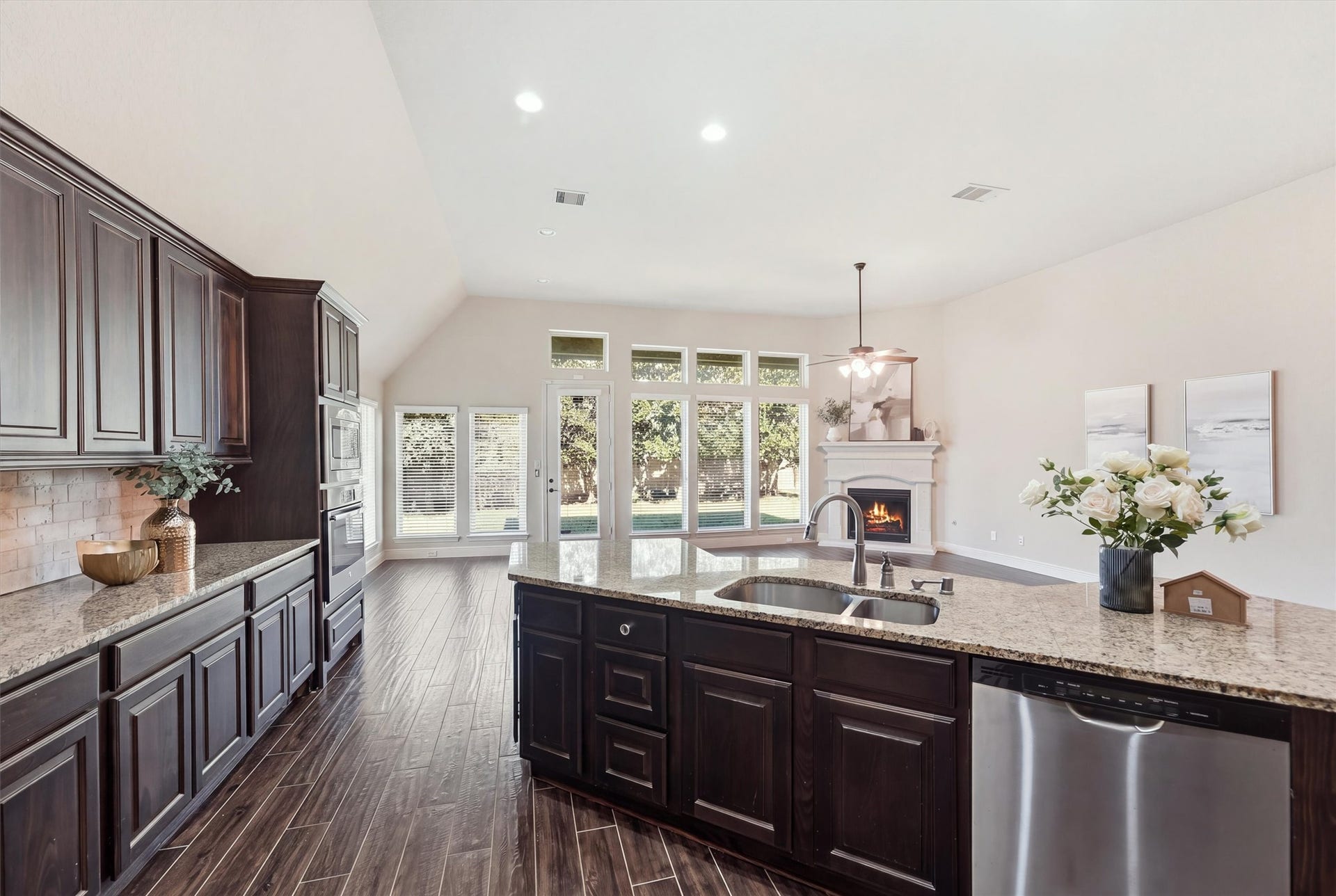 Kitchen with abundant cabinetry and generous counter space provides additional prep space and storage.