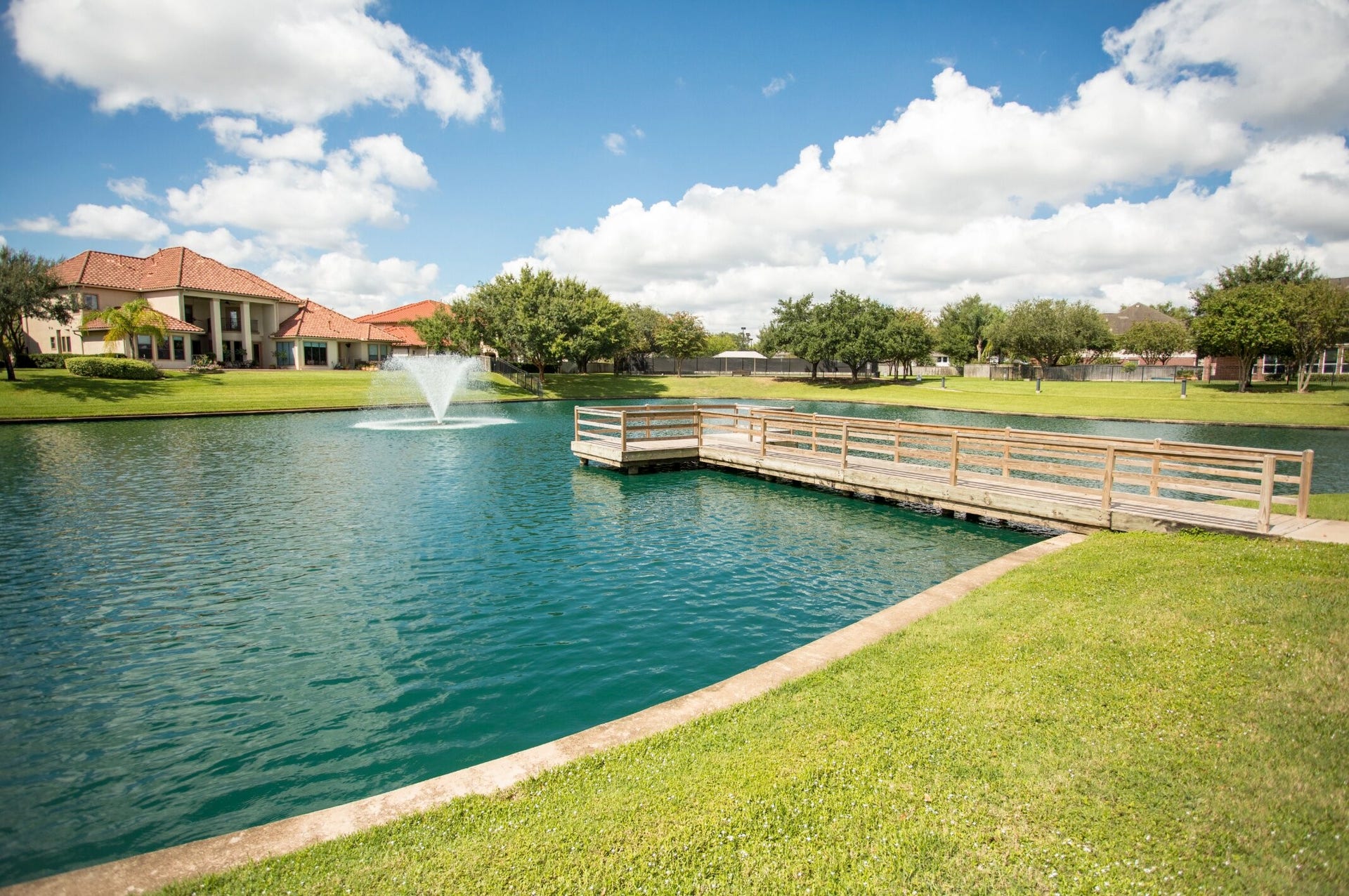 Residents can enjoy tennis courts, fishing, lakes, and beautiful green spaces.
