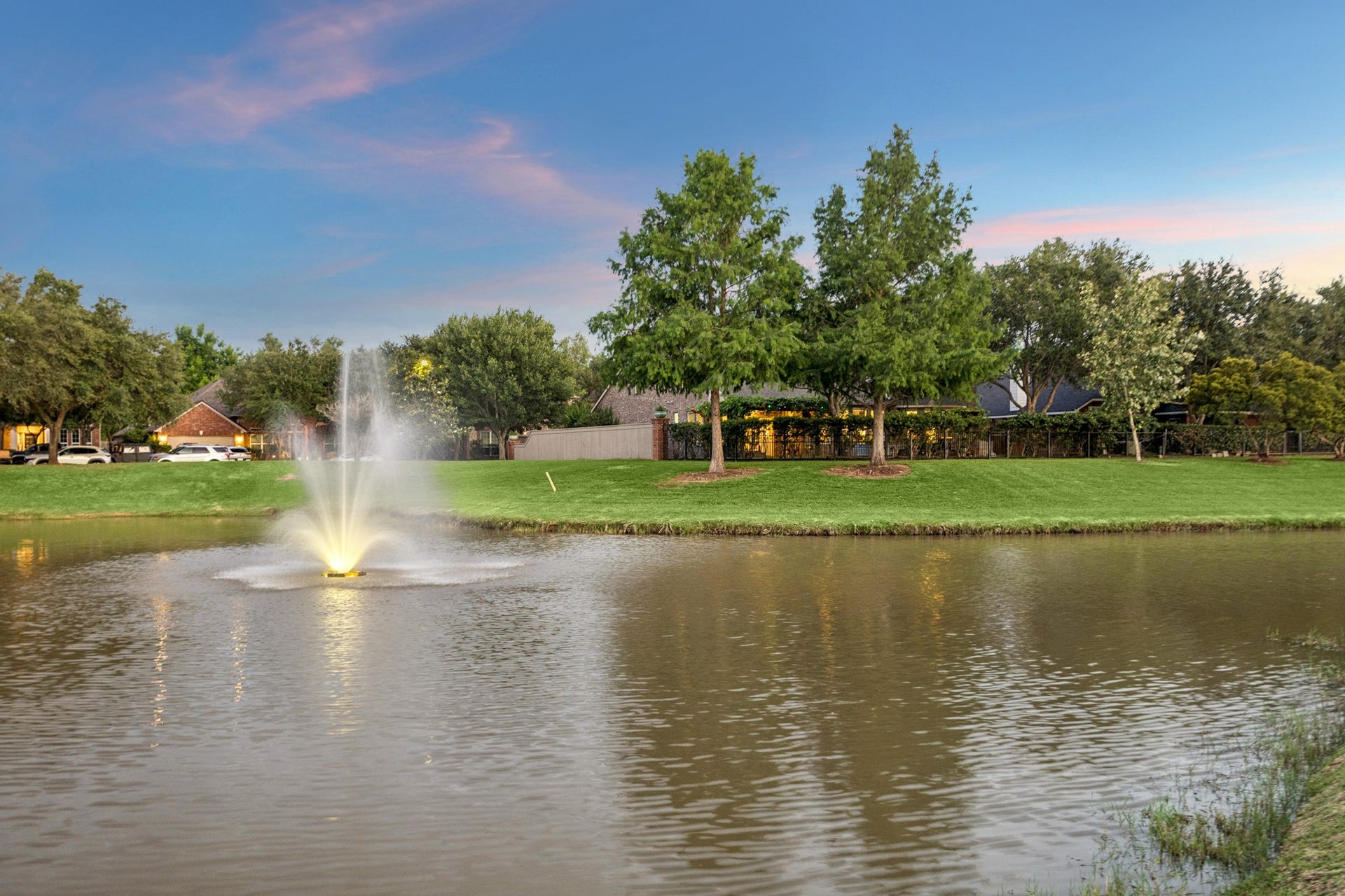 3102 London Lane, Missouri City, TX 77459 This view from across the lake shows how secluded and private the backyard is.