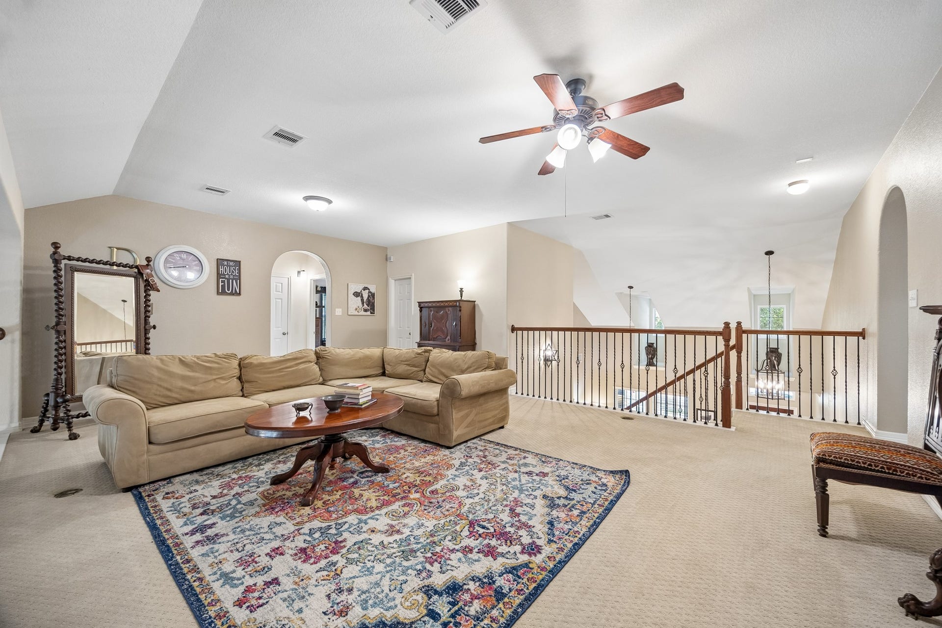 3102 London Lane, Missouri City, TX 77459 The two arches shown each lead to 2 secondary bedrooms for a total of 4 bedrooms upstairs.