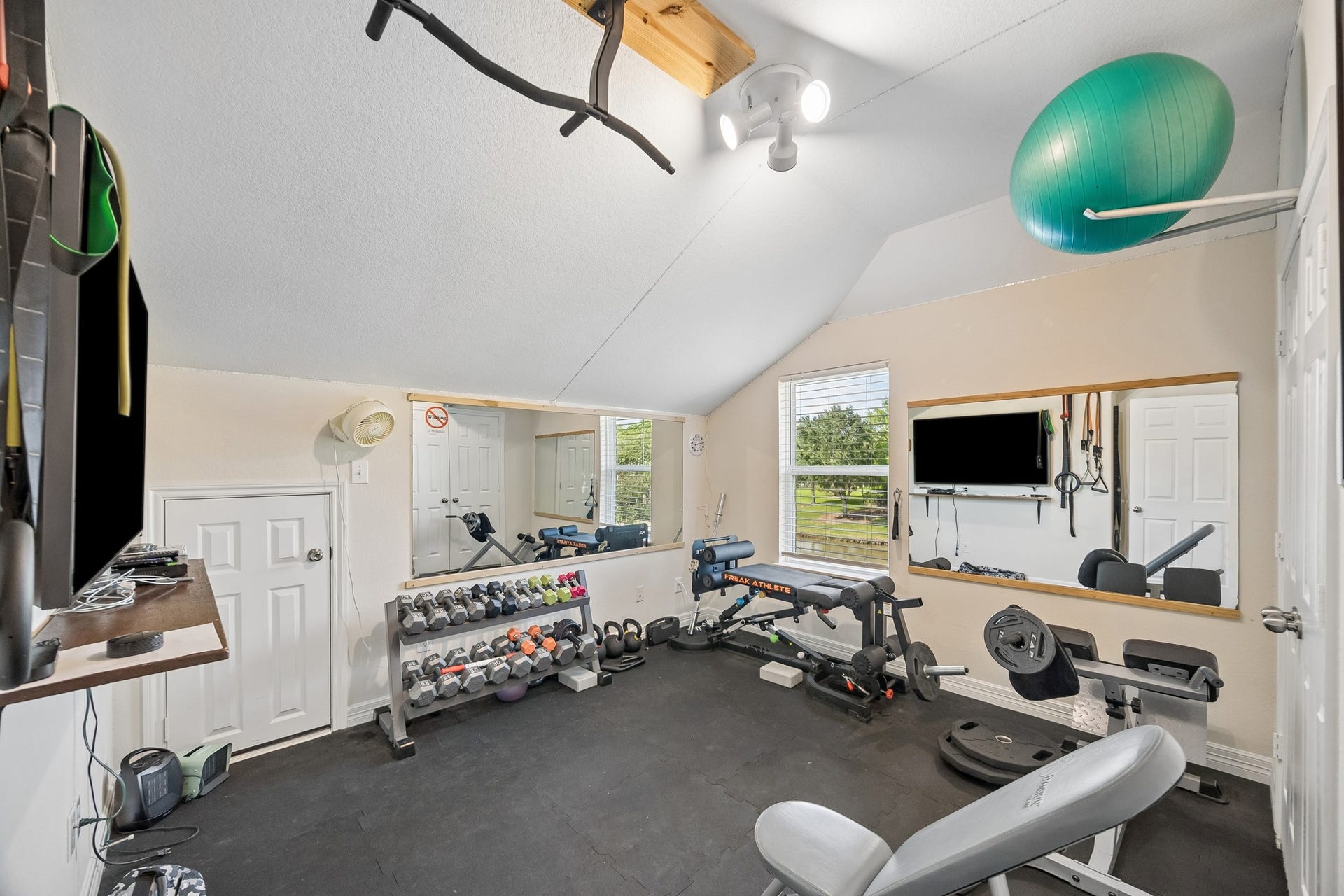 3102 London Lane, Missouri City, TX 77459 This secondary bedroom has been covnerted to a gym but can be easily converted back to a bedroom.