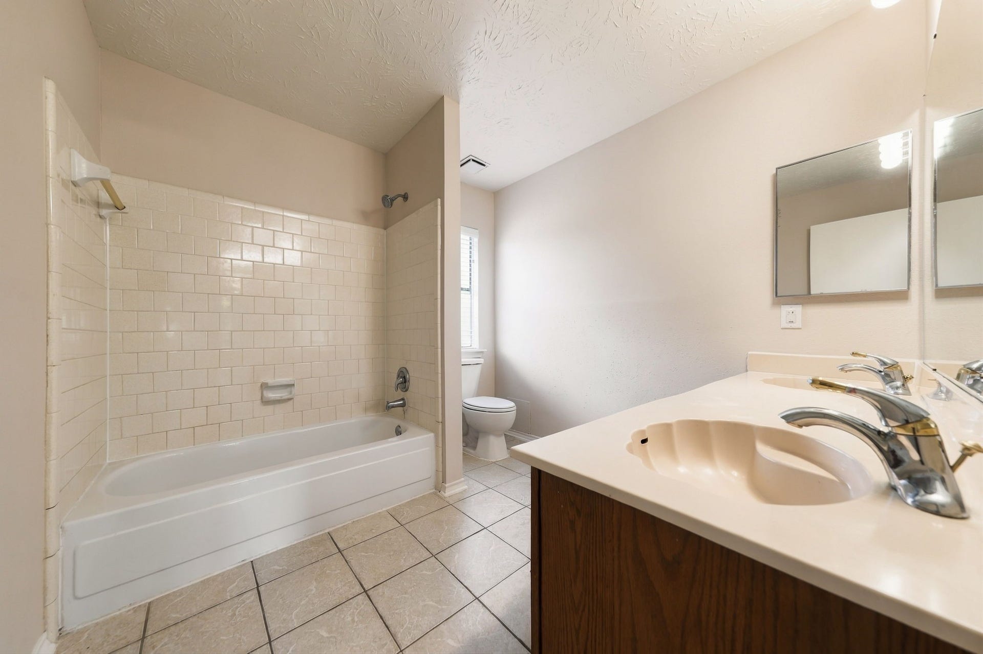 Primary bathroom with tub/shower combo