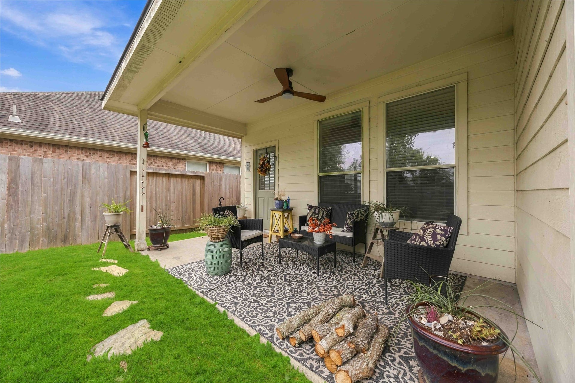 11415 English Rose Trail, Missouri City, TX 77459 Another patio angle highlighting the shaded outdoor space and direct access to the home.