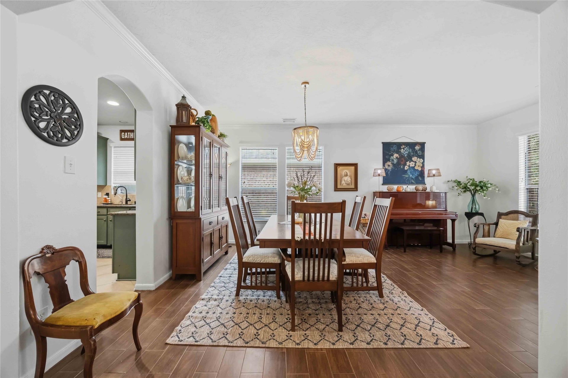 11415 English Rose Trail, Missouri City, TX 77459 Spacious formal dining area featuring a decorative chandelier and convenient access to the kitchen.