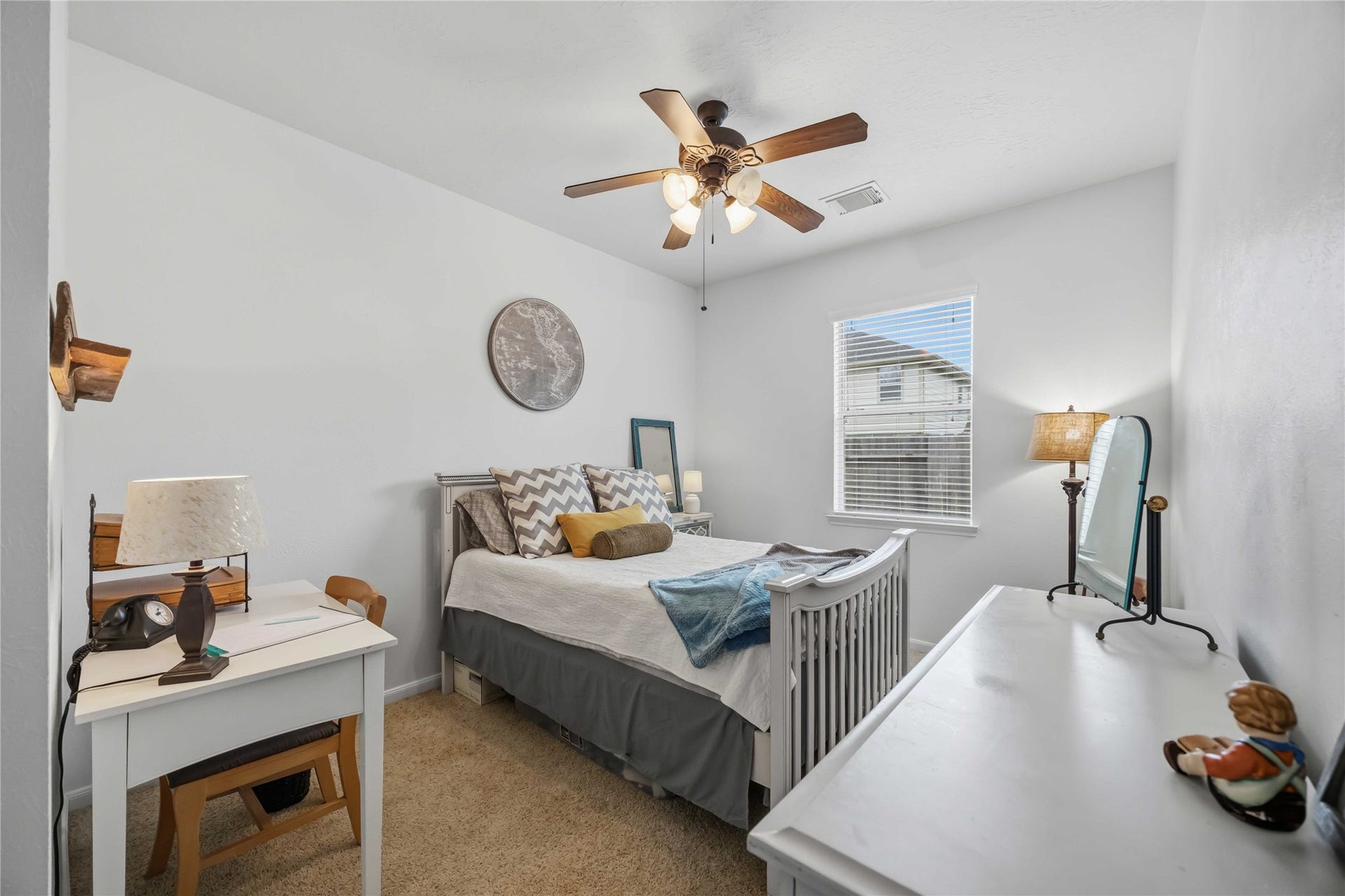 11415 English Rose Trail, Missouri City, TX 77459 Another secondary bedroom with comfortable proportions, soft carpeting, and a ceiling fan with light fixture.
