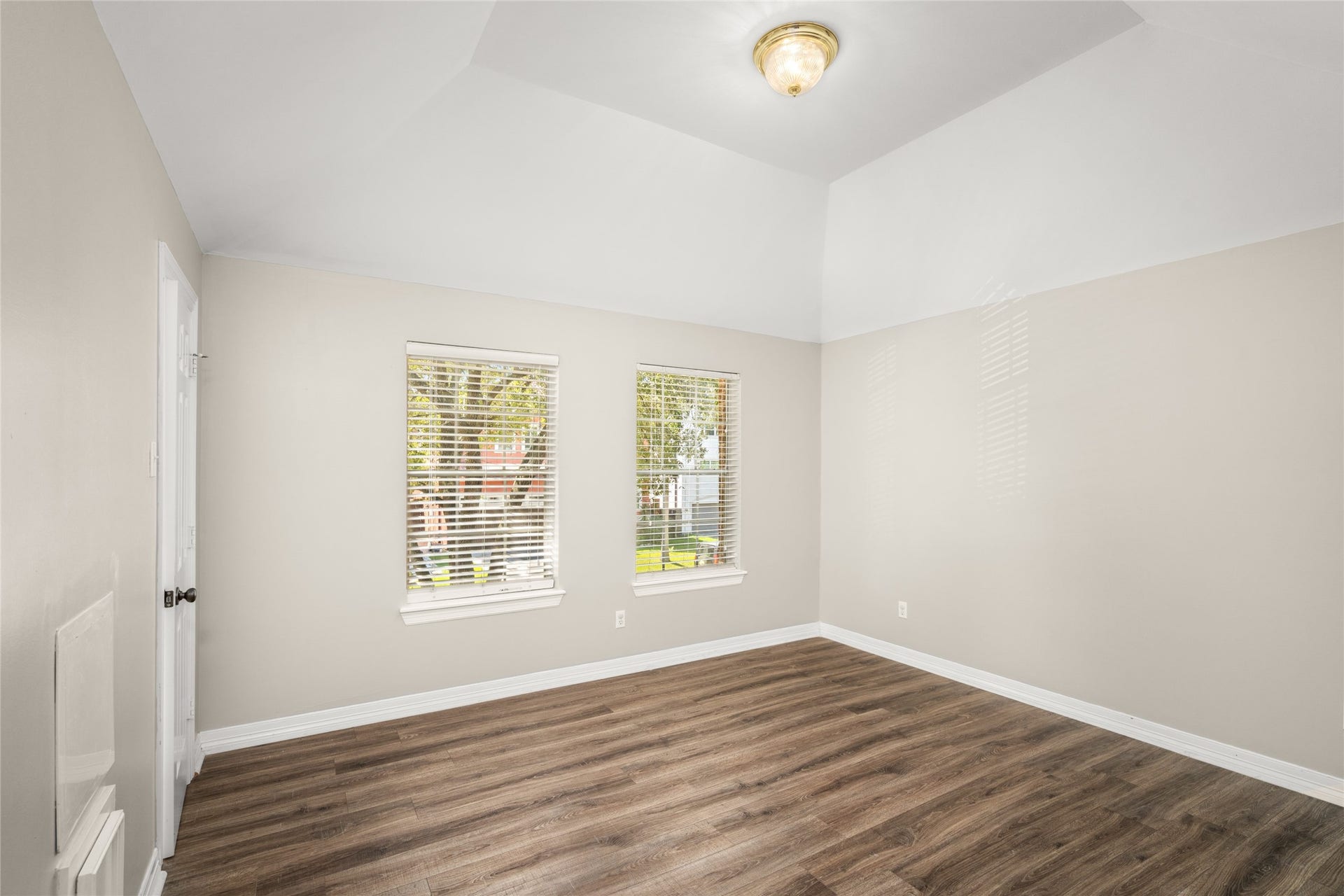 4312 Holt Street, Bellaire, TX 77401 Bedroom 2 fronts the home. Notice high ceilings.