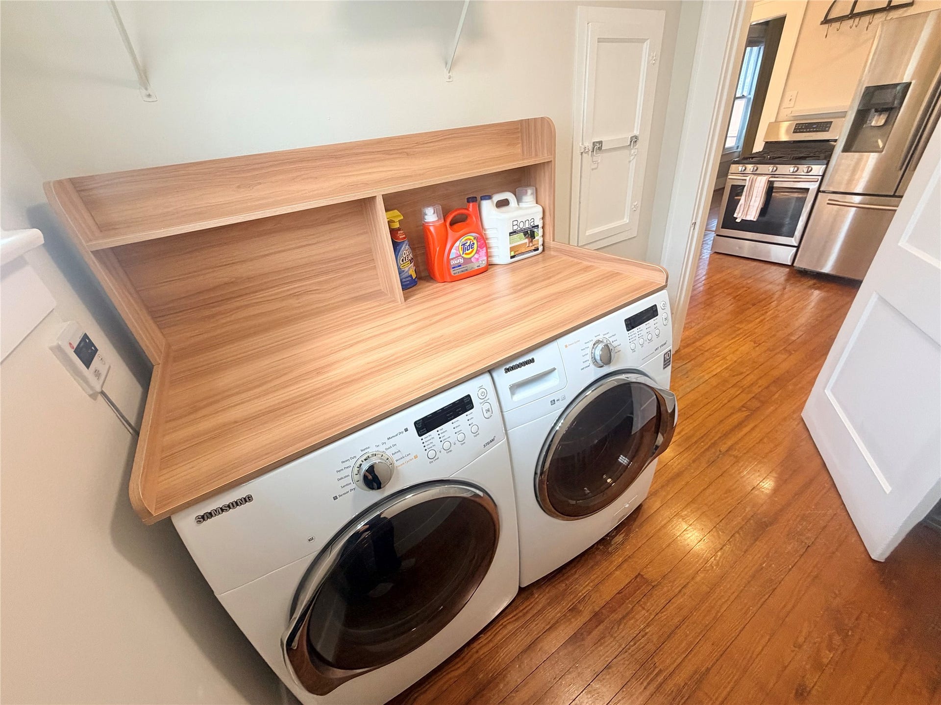 utility room features full-size washer / dryer