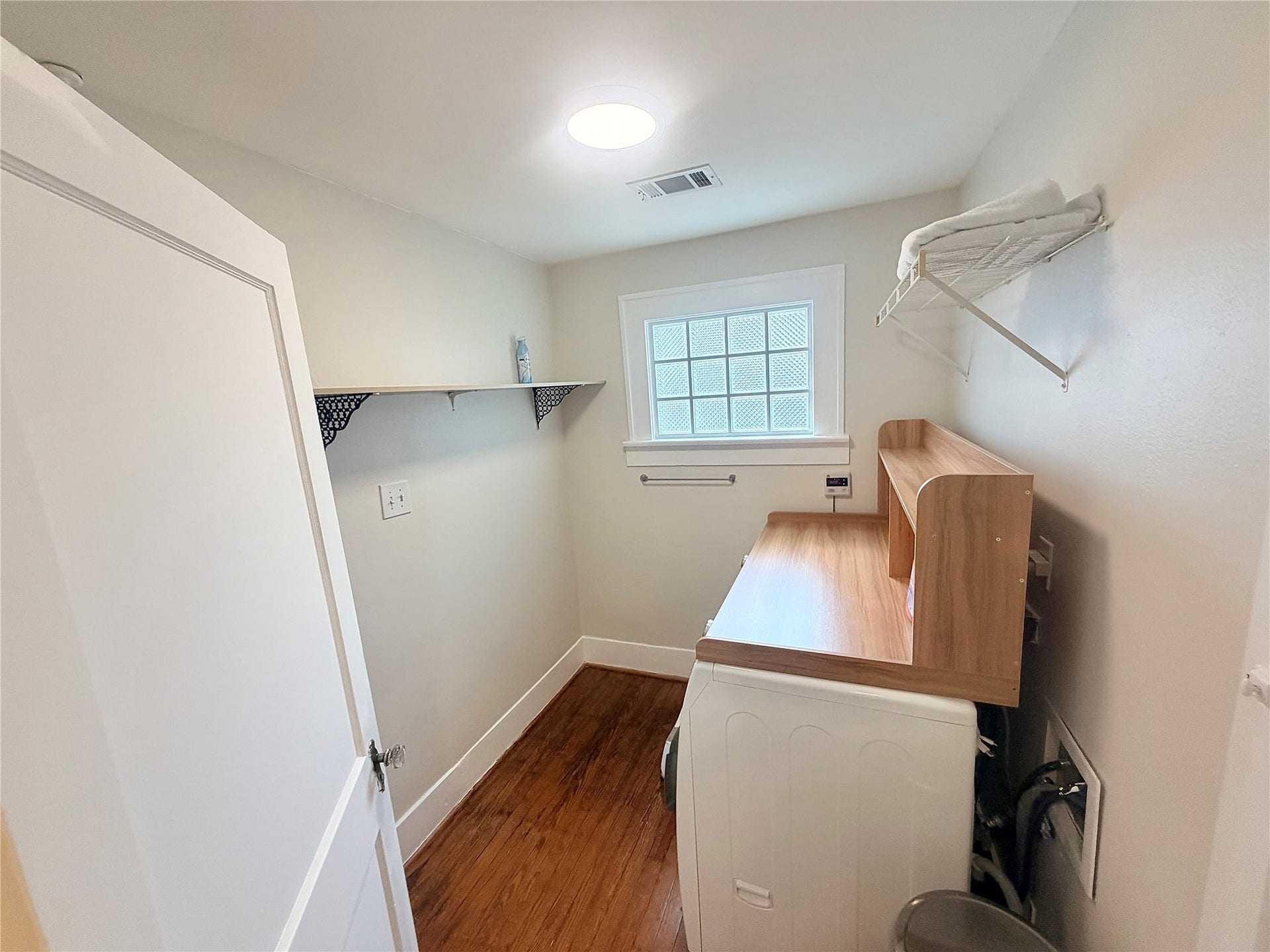 view of utility room from kitchen