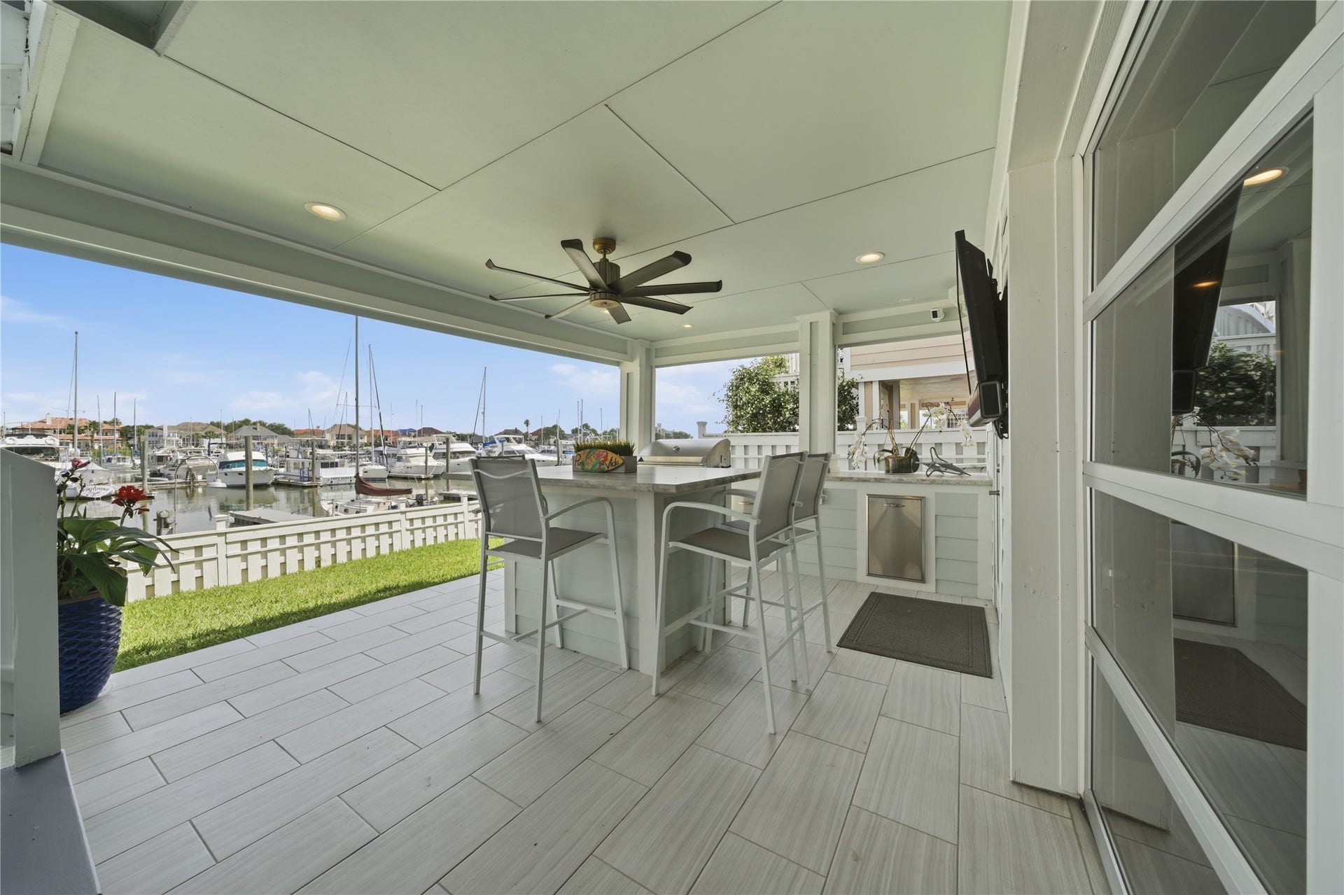 2174 Marina Way, Kemah, TX 77565 The outdoor kitchen off of the garage, allows for extra entertaining space.