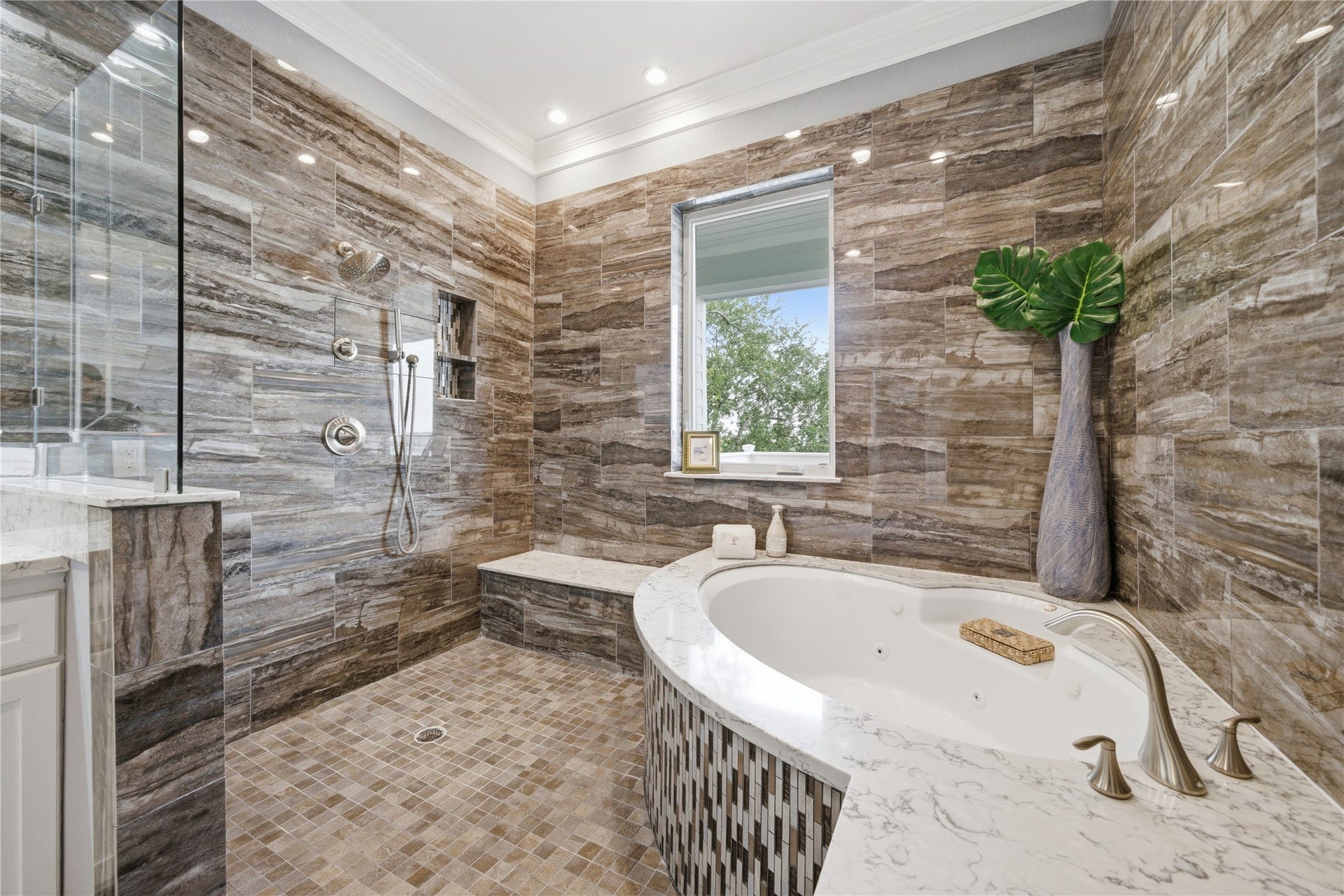 2174 Marina Way, Kemah, TX 77565 The primary bathroom has a huge walk-in shower, complete with jetted tub.