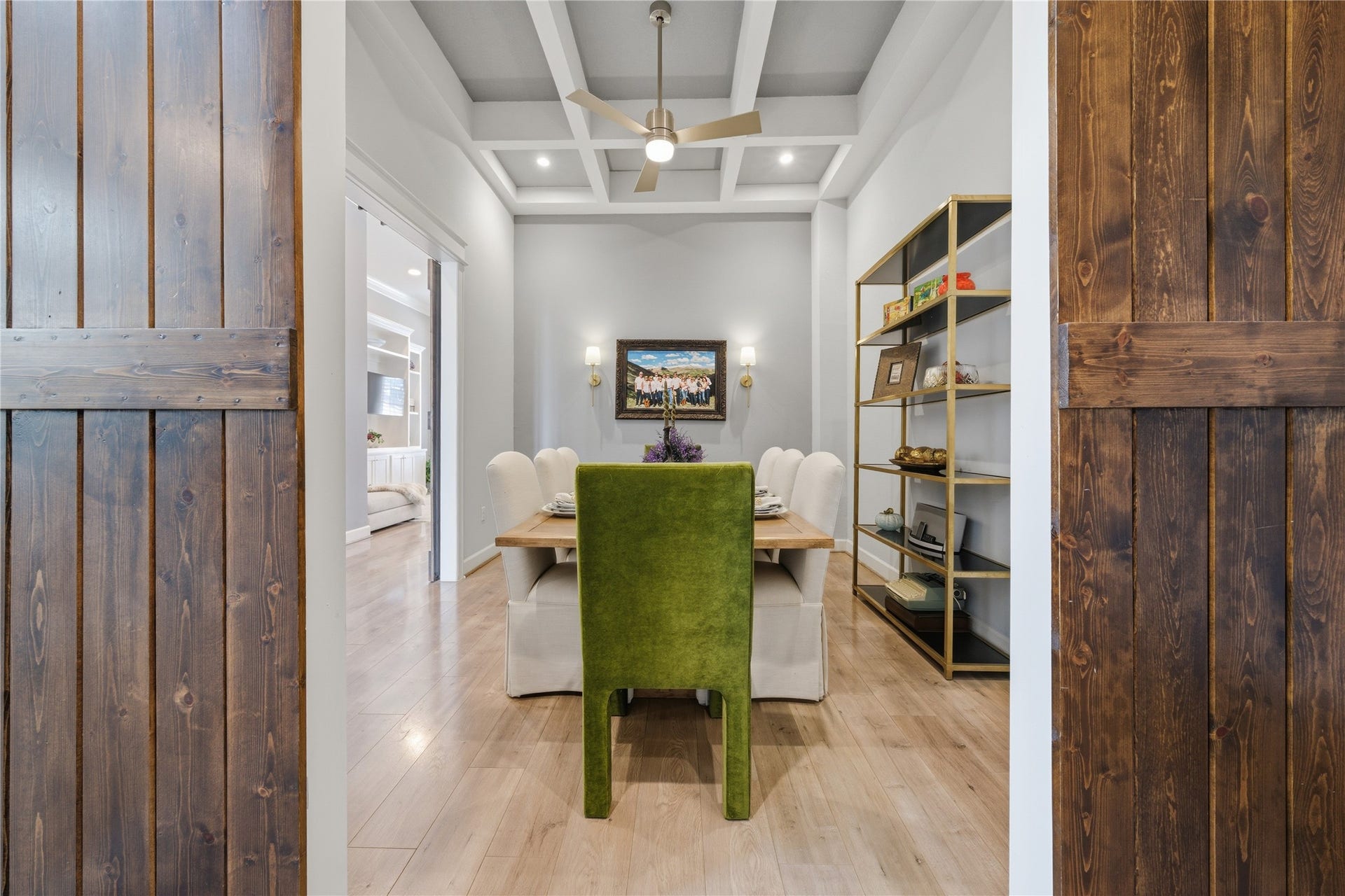 2174 Marina Way, Kemah, TX 77565 The dining room has dual entry, both with wood barn doors. Notice the coffered ceiling.