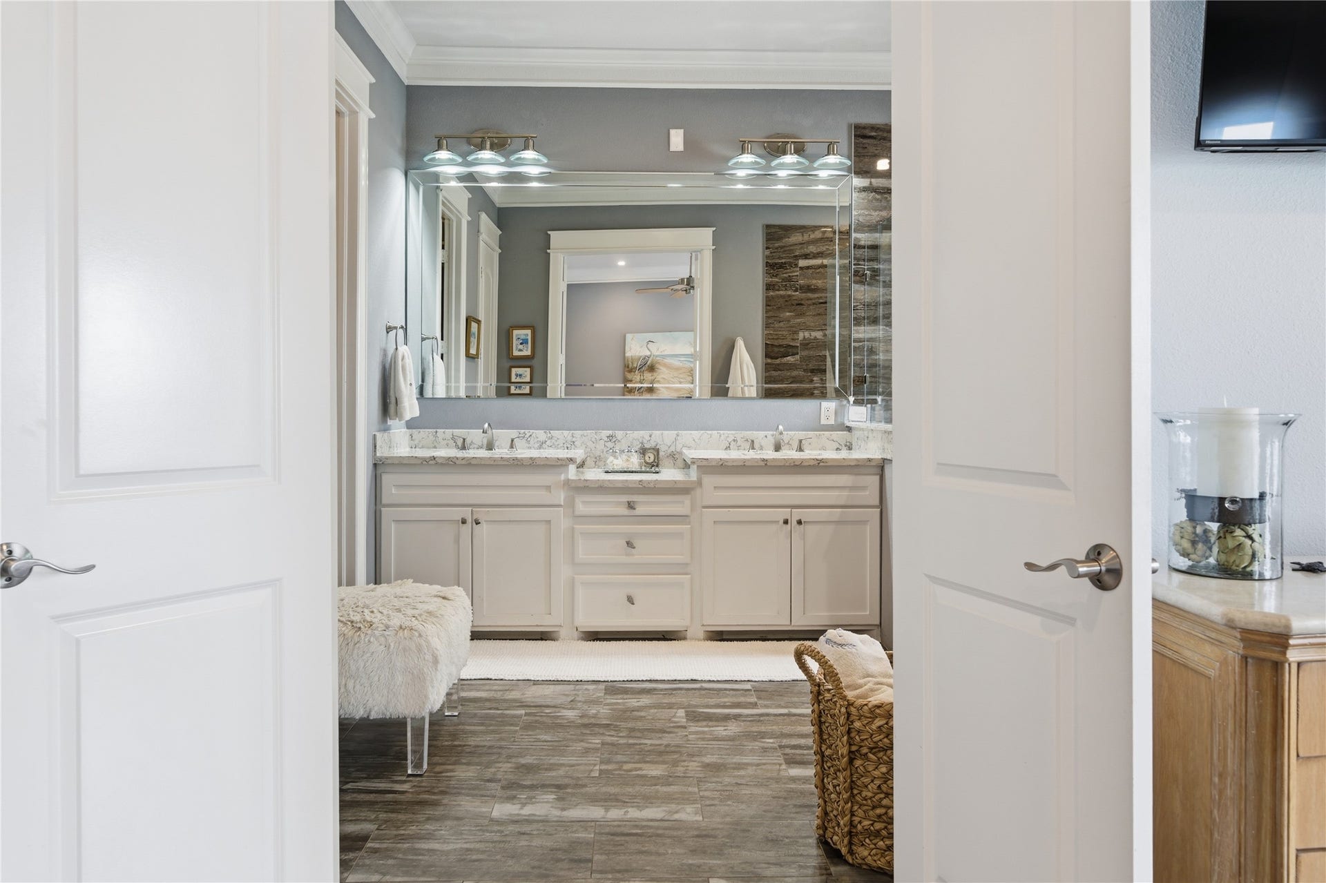 2174 Marina Way, Kemah, TX 77565 The spacious primary bedroom has a dual vanity.