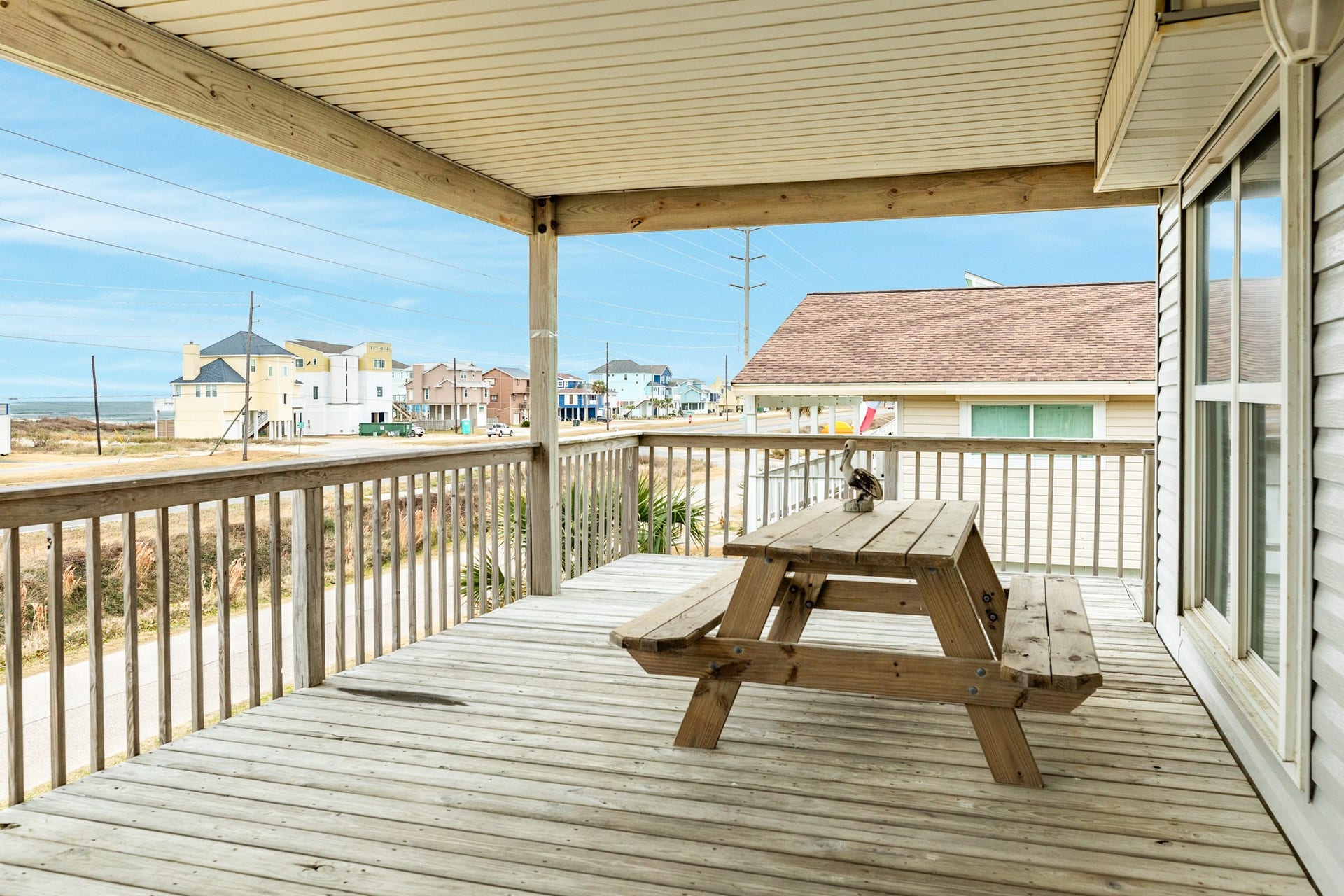 23012 Verano Drive, Galveston, TX 77554 Should you prefer dining 'al fresco', simply step outside to the covered deck area.