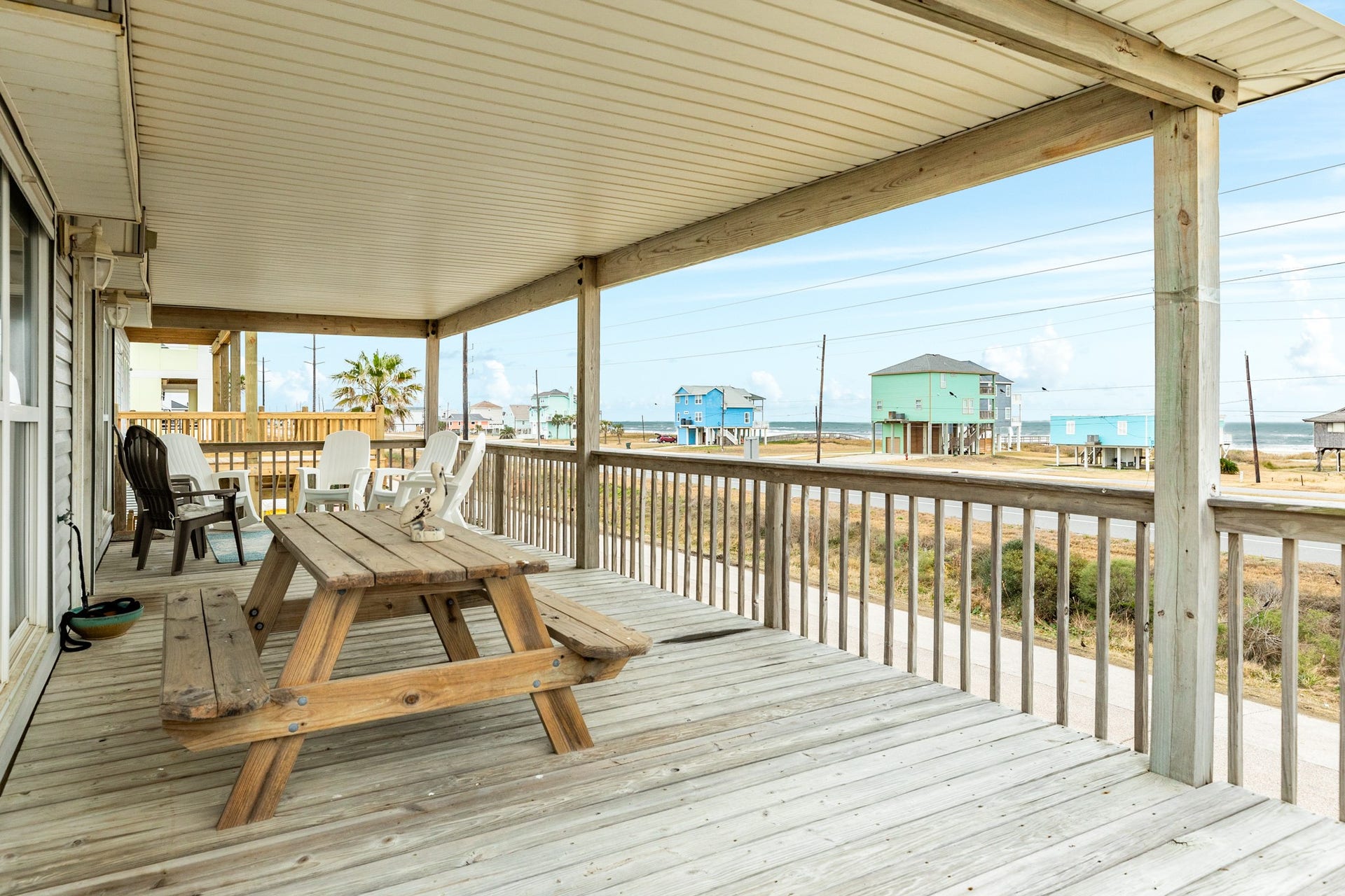 23012 Verano Drive, Galveston, TX 77554 Sit back and enjoy the sounds of the Gulf and cool breezes on your covered front deck