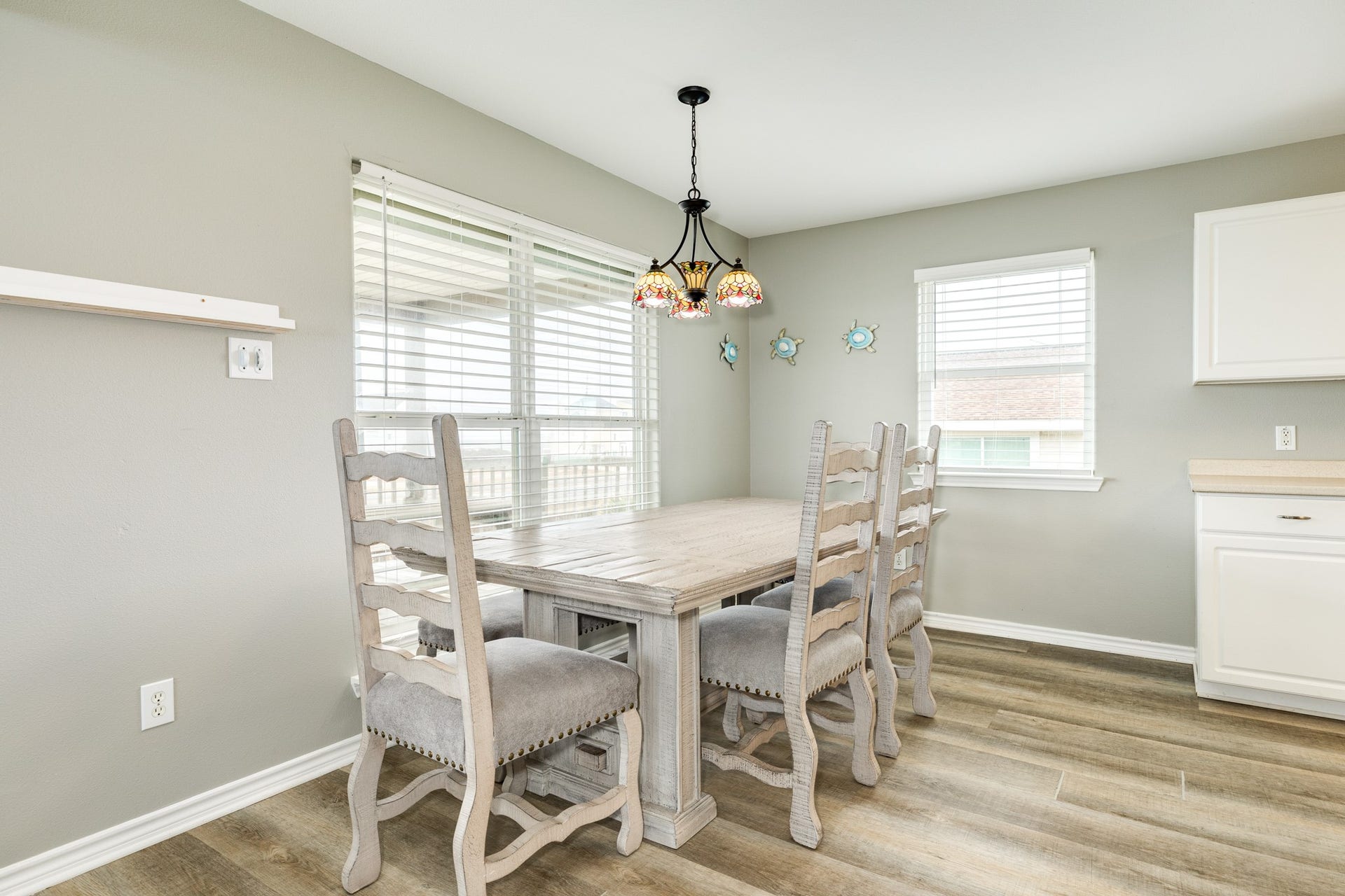 23012 Verano Drive, Galveston, TX 77554 LVP flooring throughout home for ease in maintenance and consistent look throughout the home.