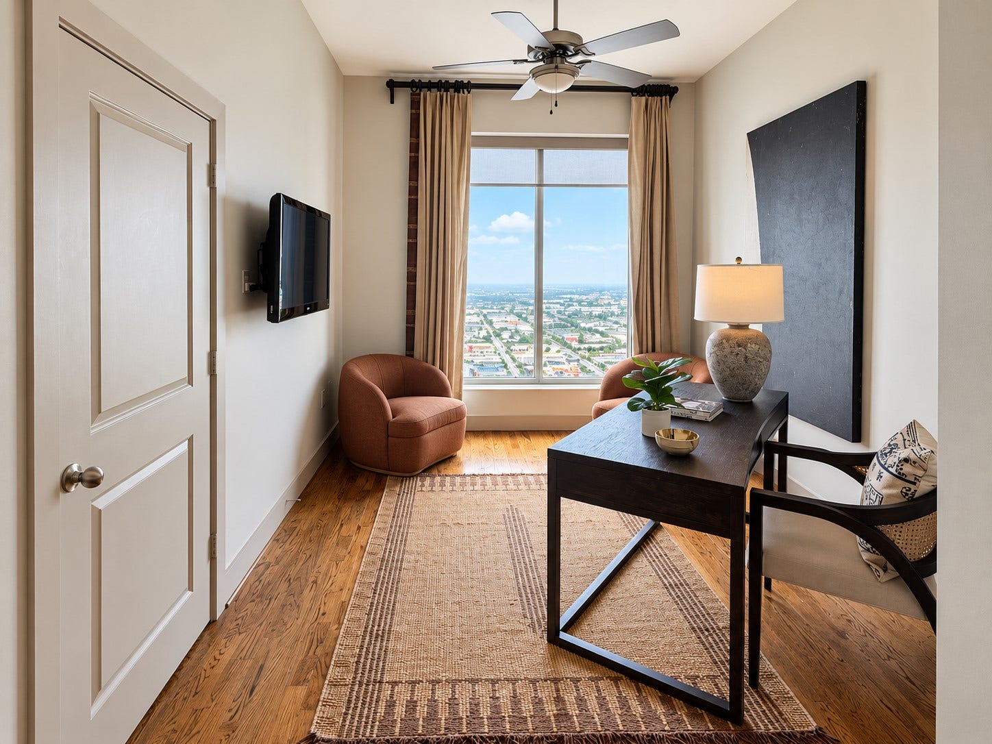 Imagine starting your morning here with coffee and the city stretching out beyond the window. This flexible room makes an exceptional home office, reading room or intimate lounge, proof that refined living can be both beautiful and functional.