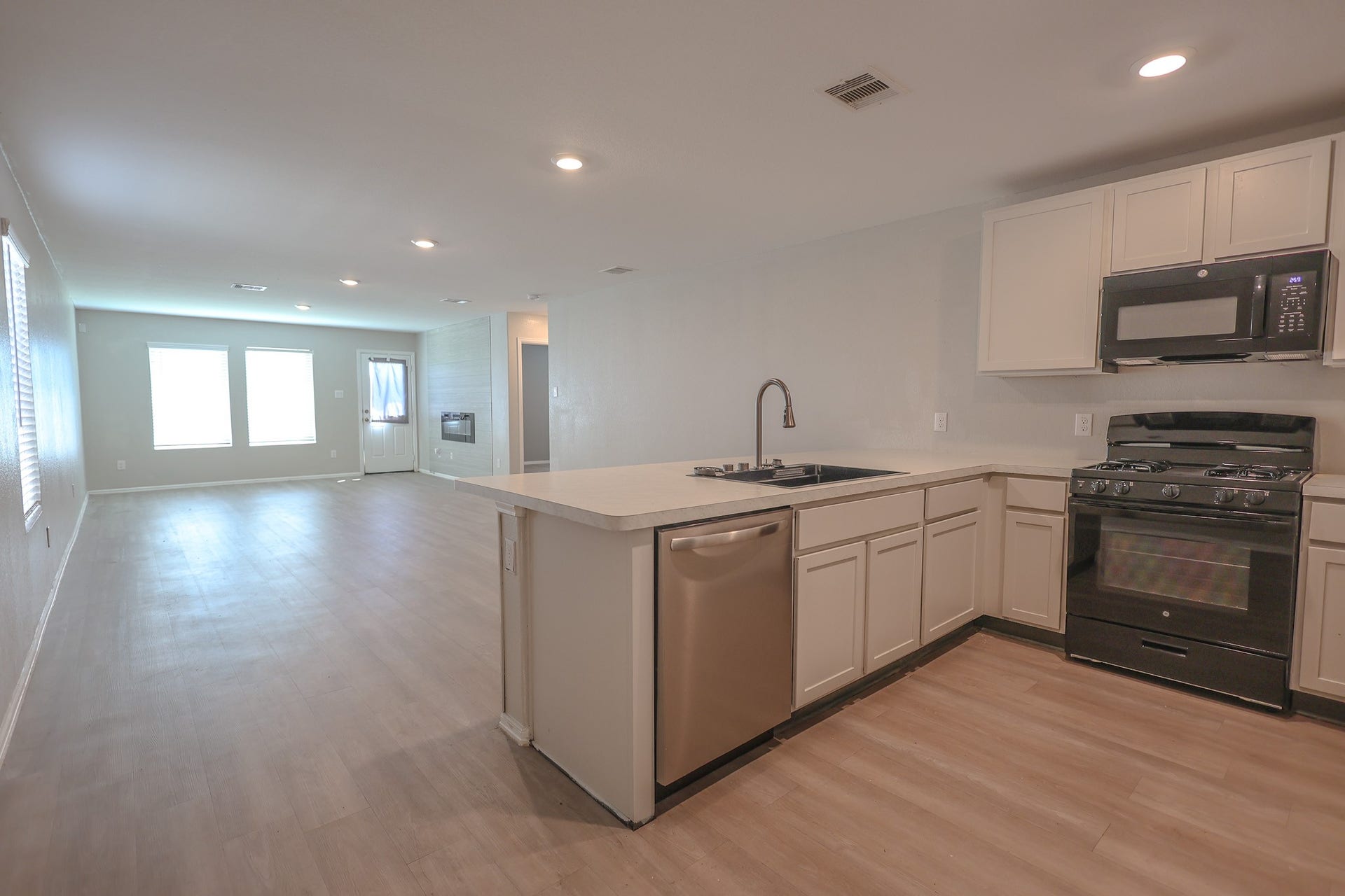 Kitchen is open to Dining & Living Room
