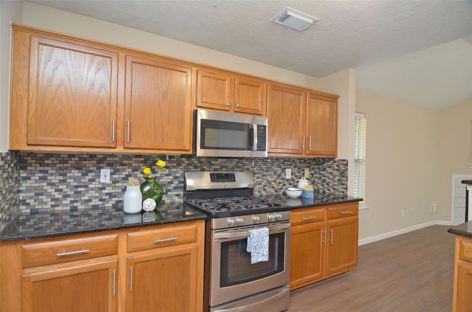 Updated kitchen granite counter tops.