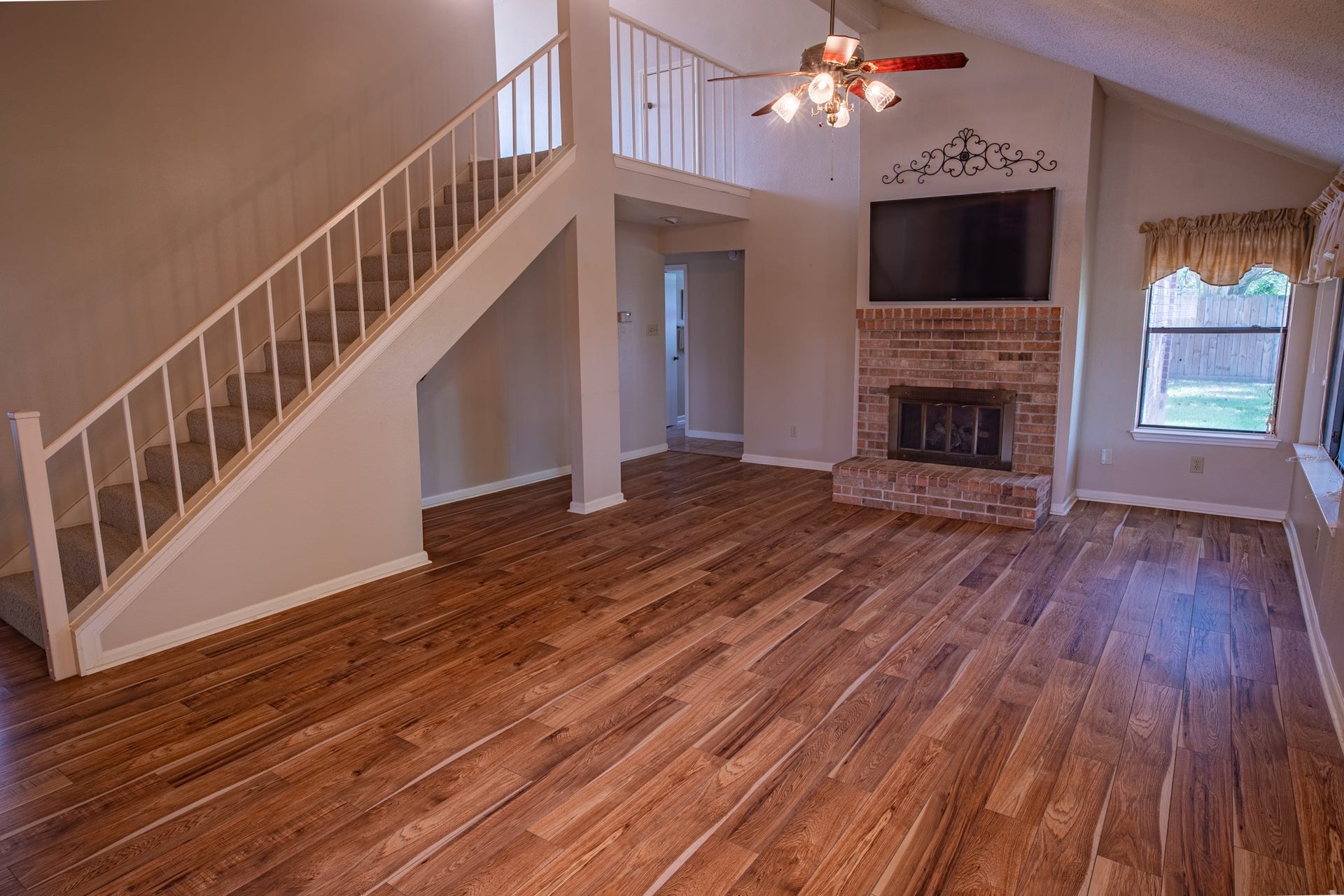 Living Room-View of Second Level Staircase to BONUS Space!