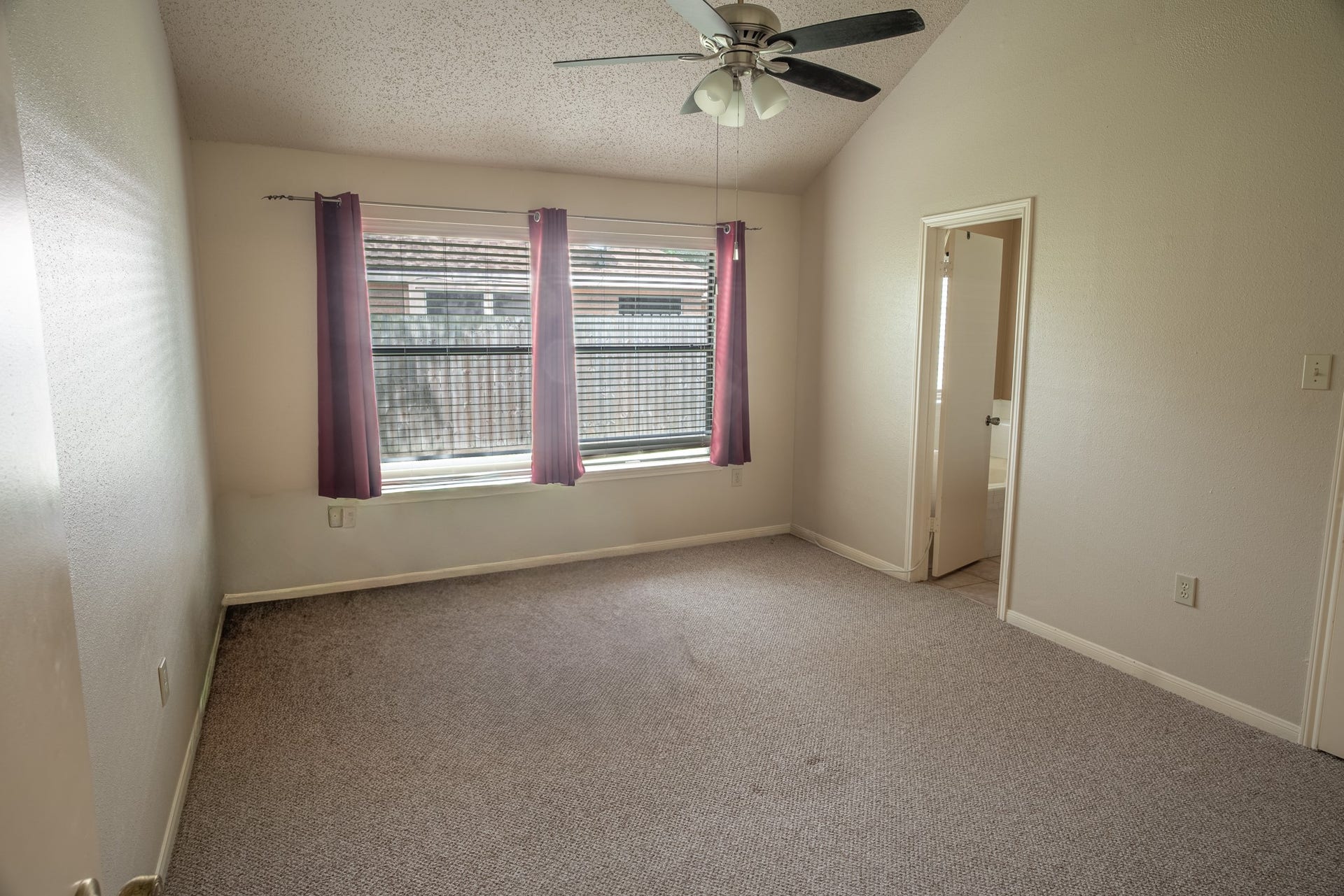 Primary Bedroom with Vaulted Ceilings