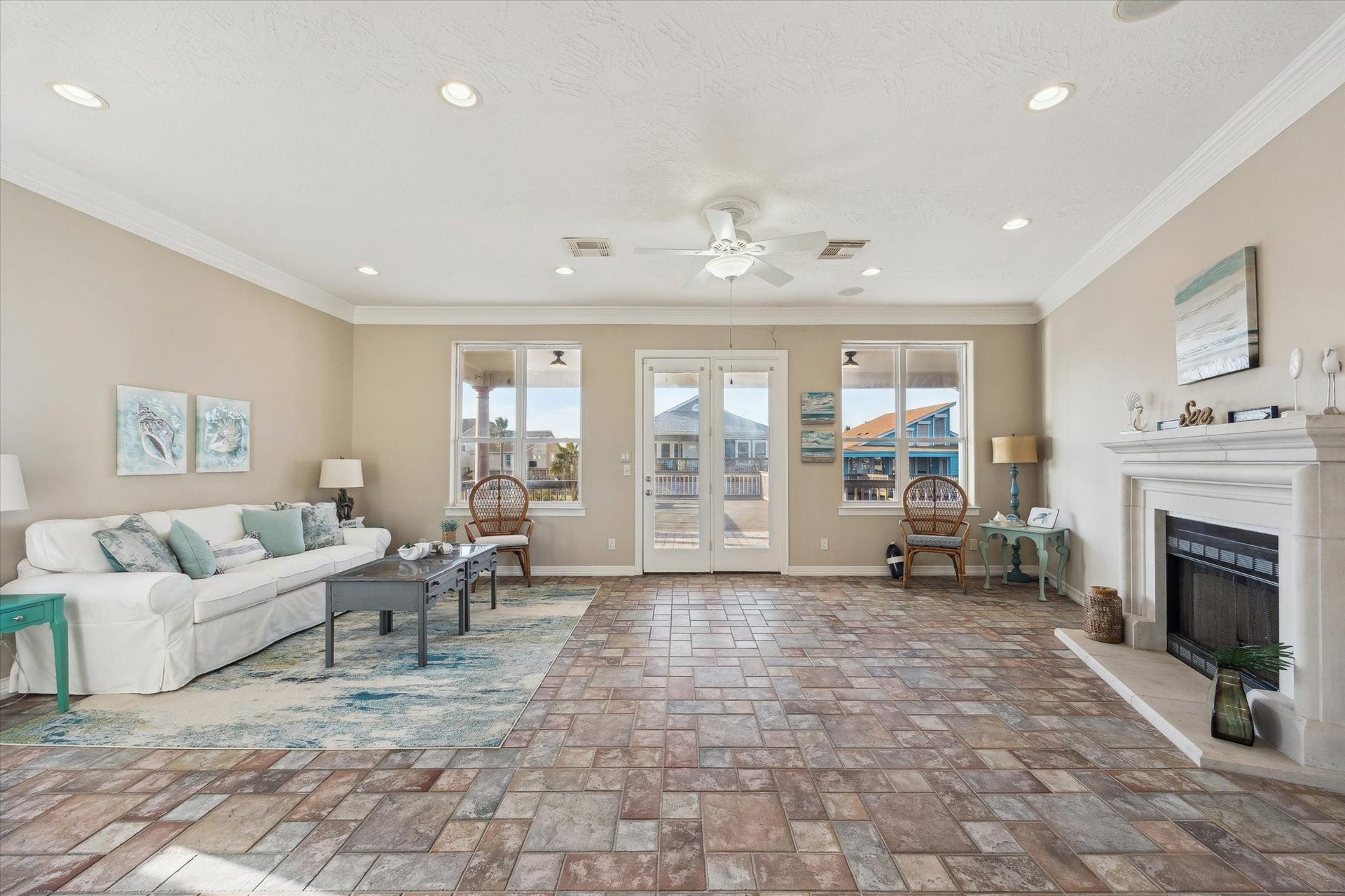 Large family room includes a showcase fireplace