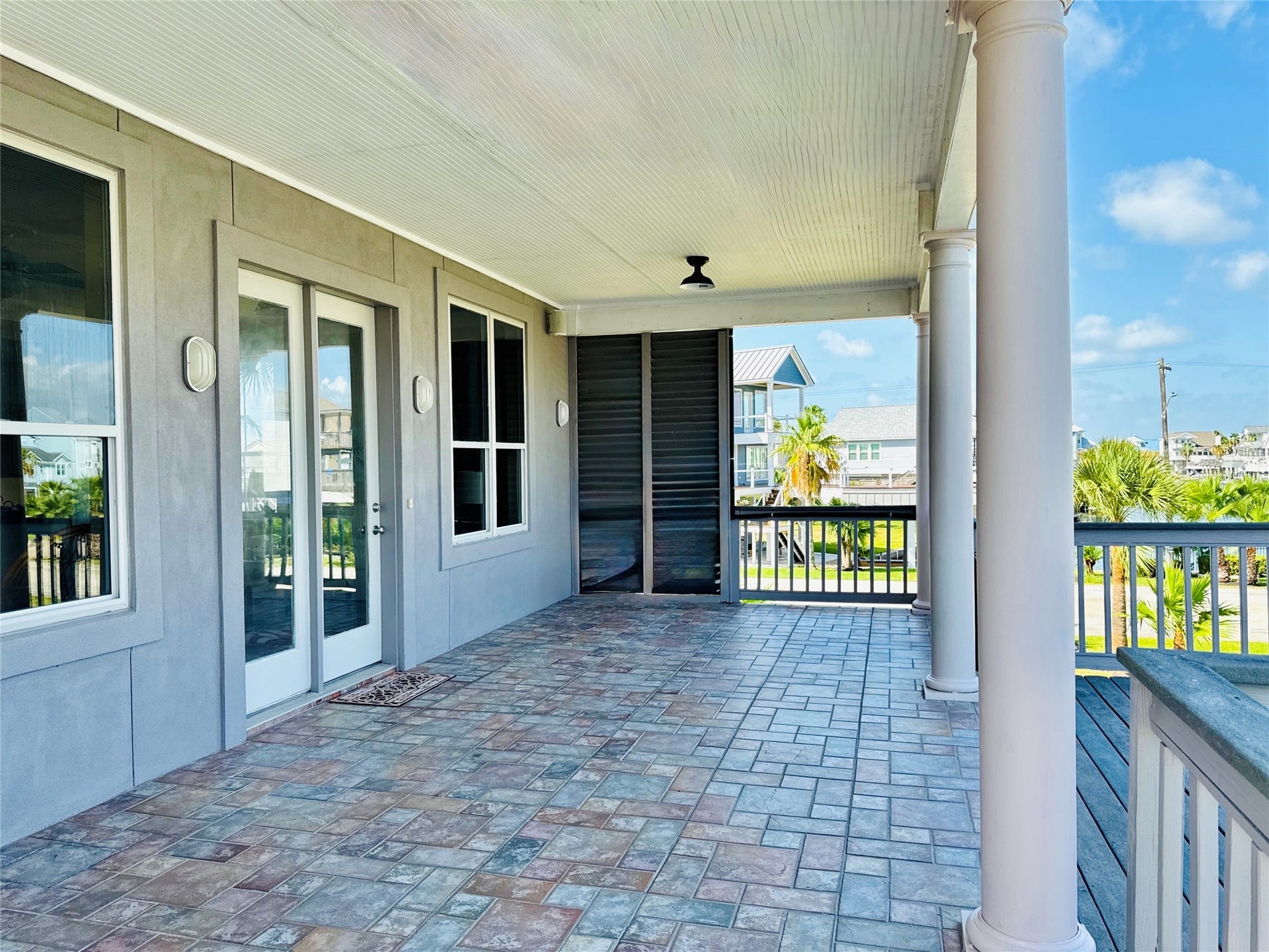 Step out onto the first floor covered patio