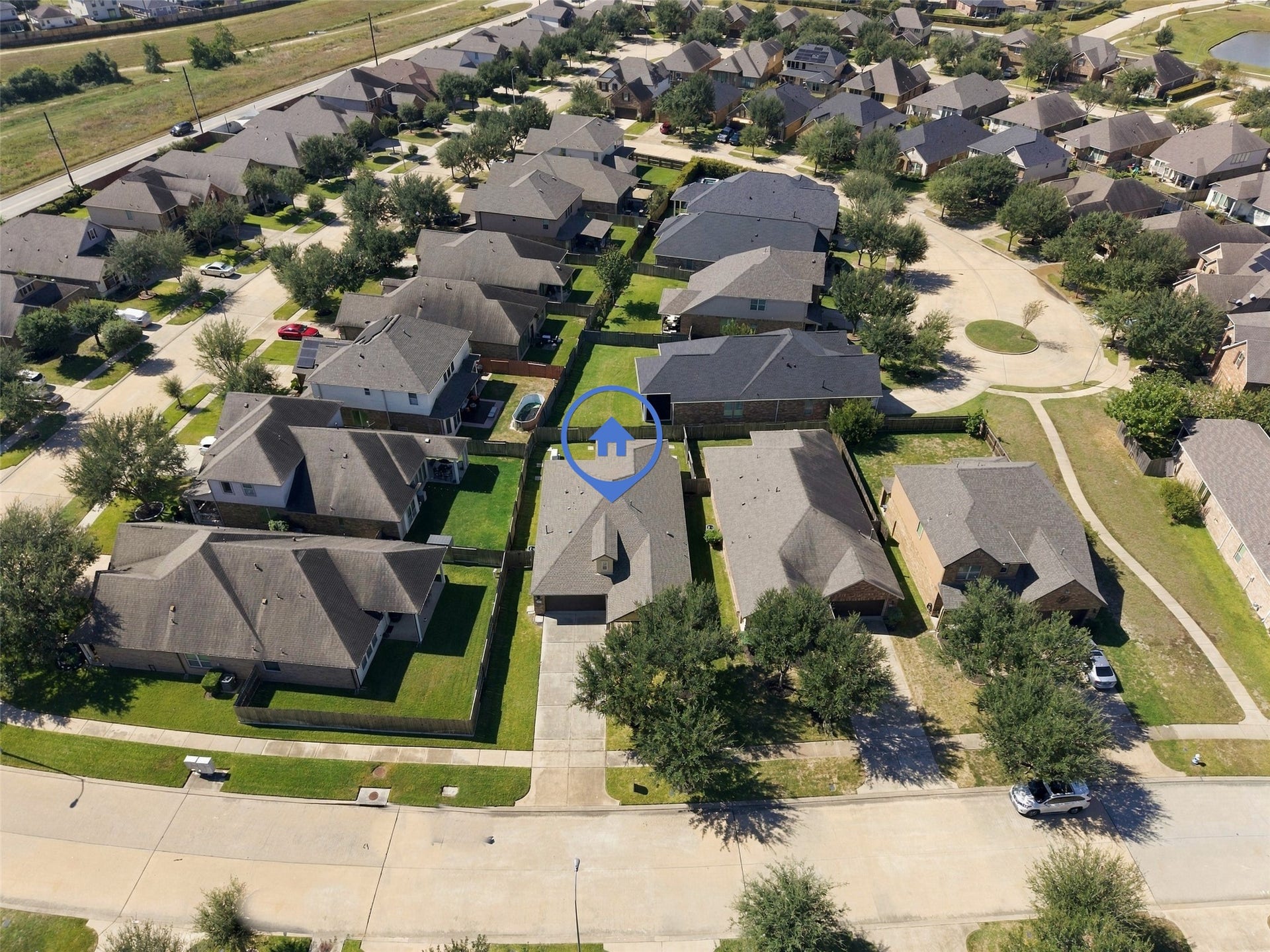 8119 W Pine Creek Bend, Cypress, TX 77433 The aerial view showcases the property and community.