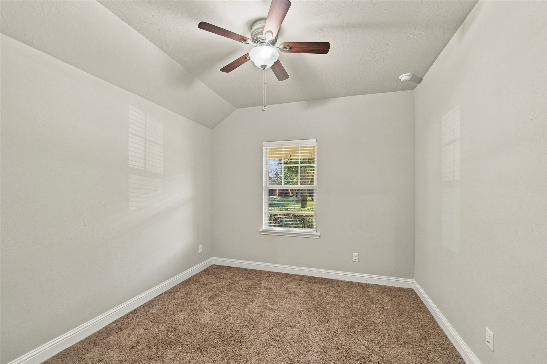 8119 W Pine Creek Bend, Cypress, TX 77433 One of two secondary bedrooms.
