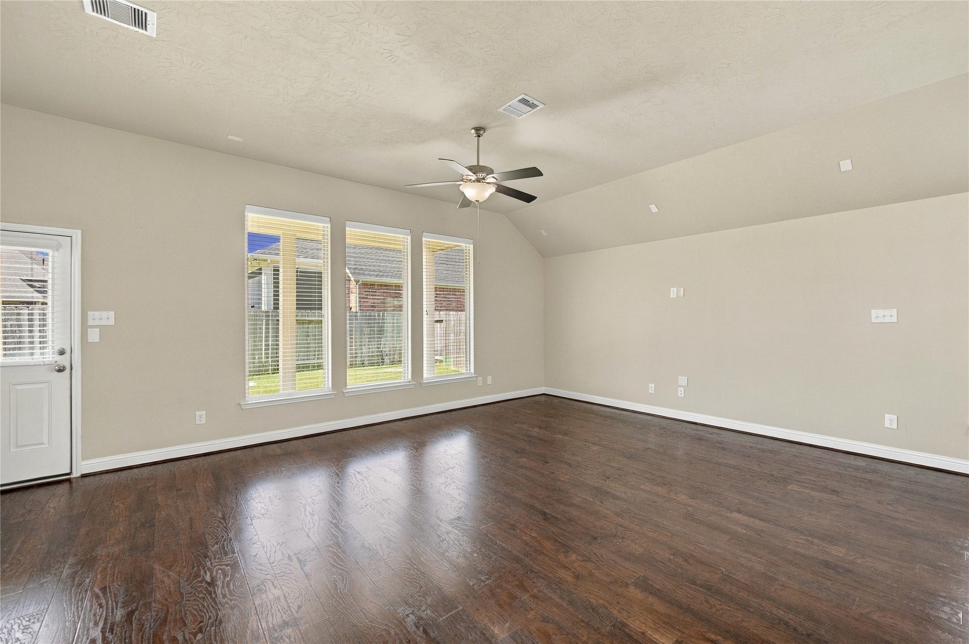 8119 W Pine Creek Bend, Cypress, TX 77433 The heart of the home, the family room.