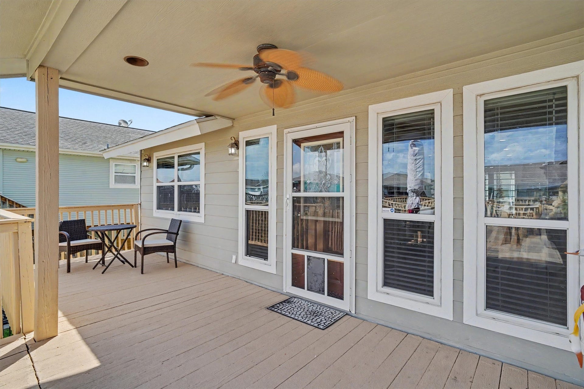 Relax on the covered porch with a cup of coffee in the morning. There are plenty of  updated windows in the home to allow great water views