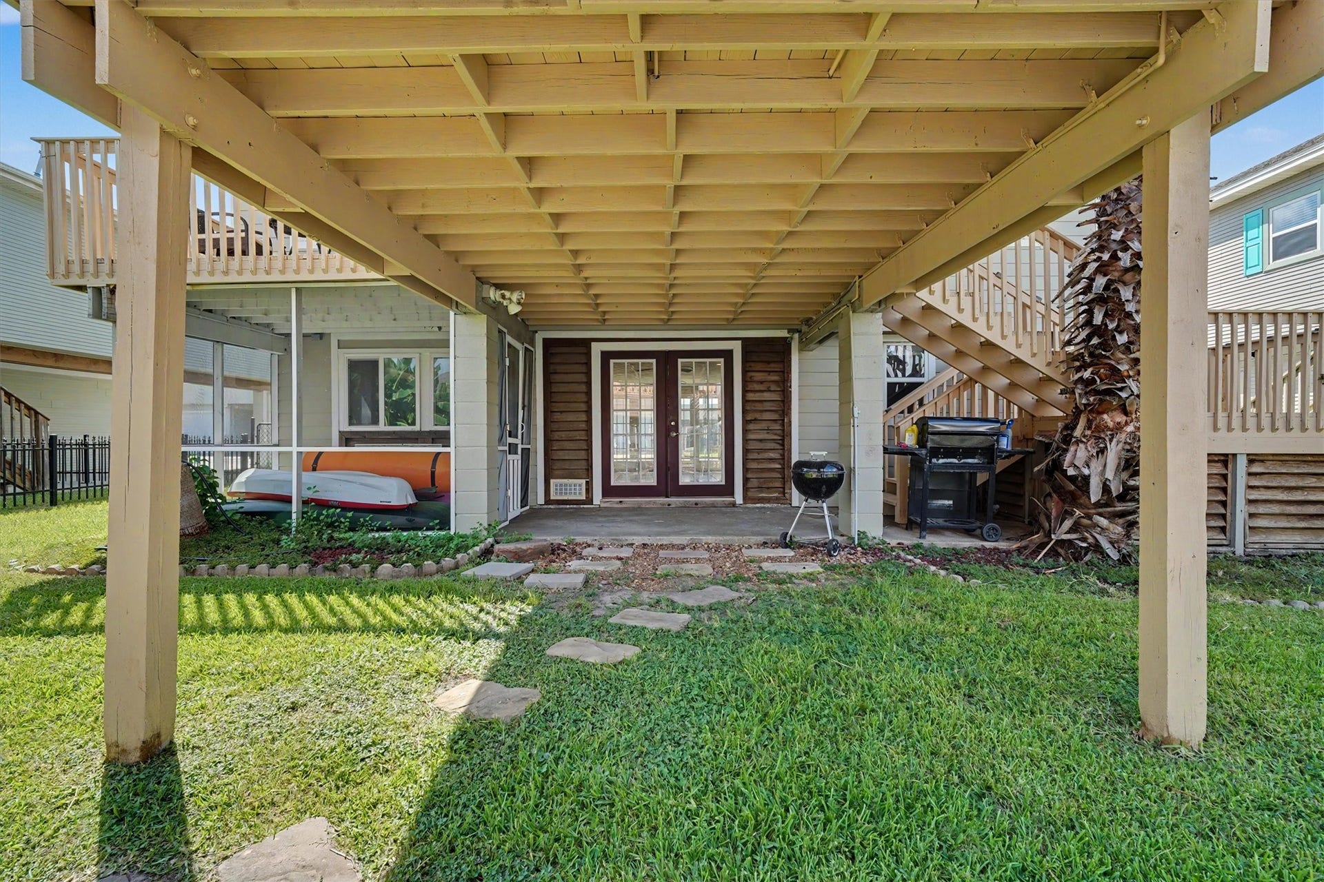 Downstairs area. A buyer could add some additional concrete to enlarge the area