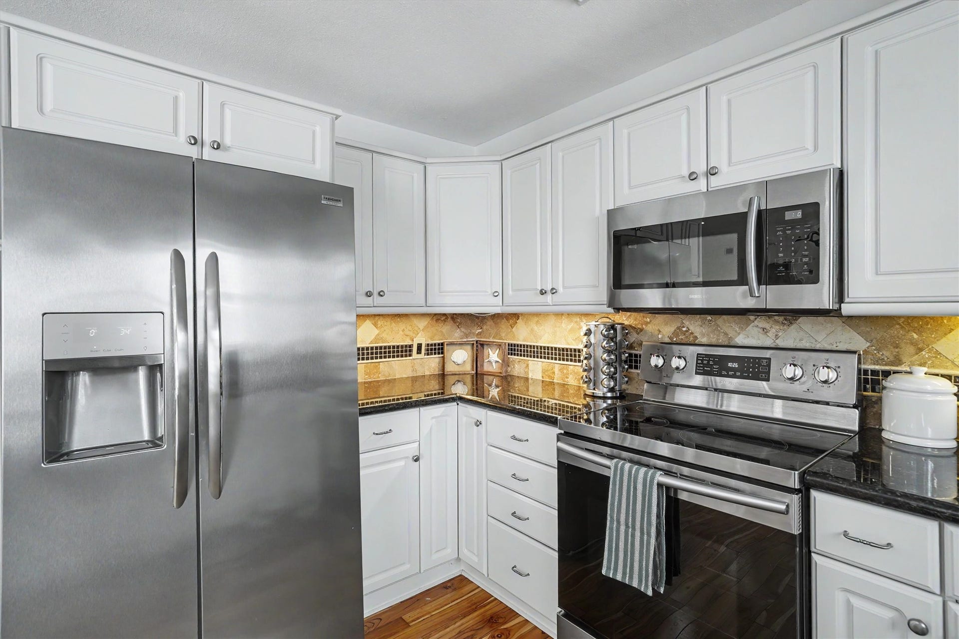 Kitchen refrigerator stays with the home