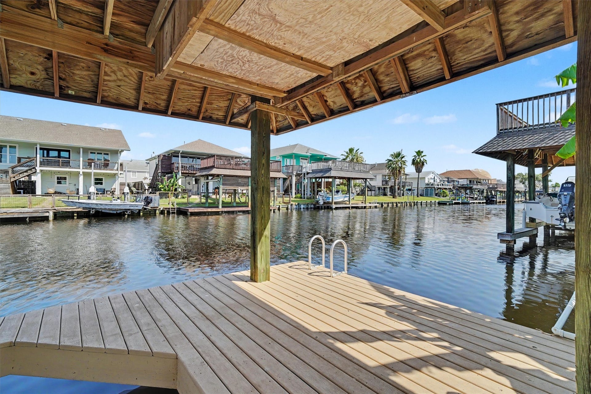Large dock with a ladder which is perfect for swimming days in the canal or kayaking