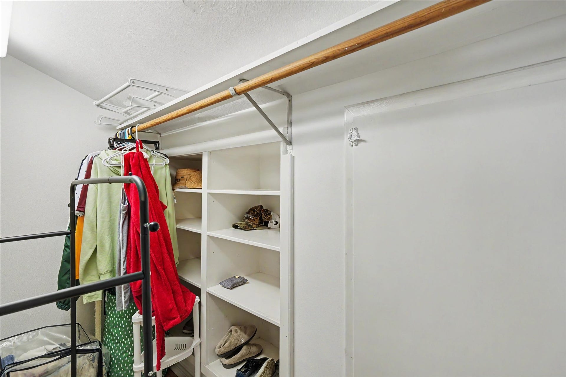 Plenty of closet space in the primary. Notice the built in shelves