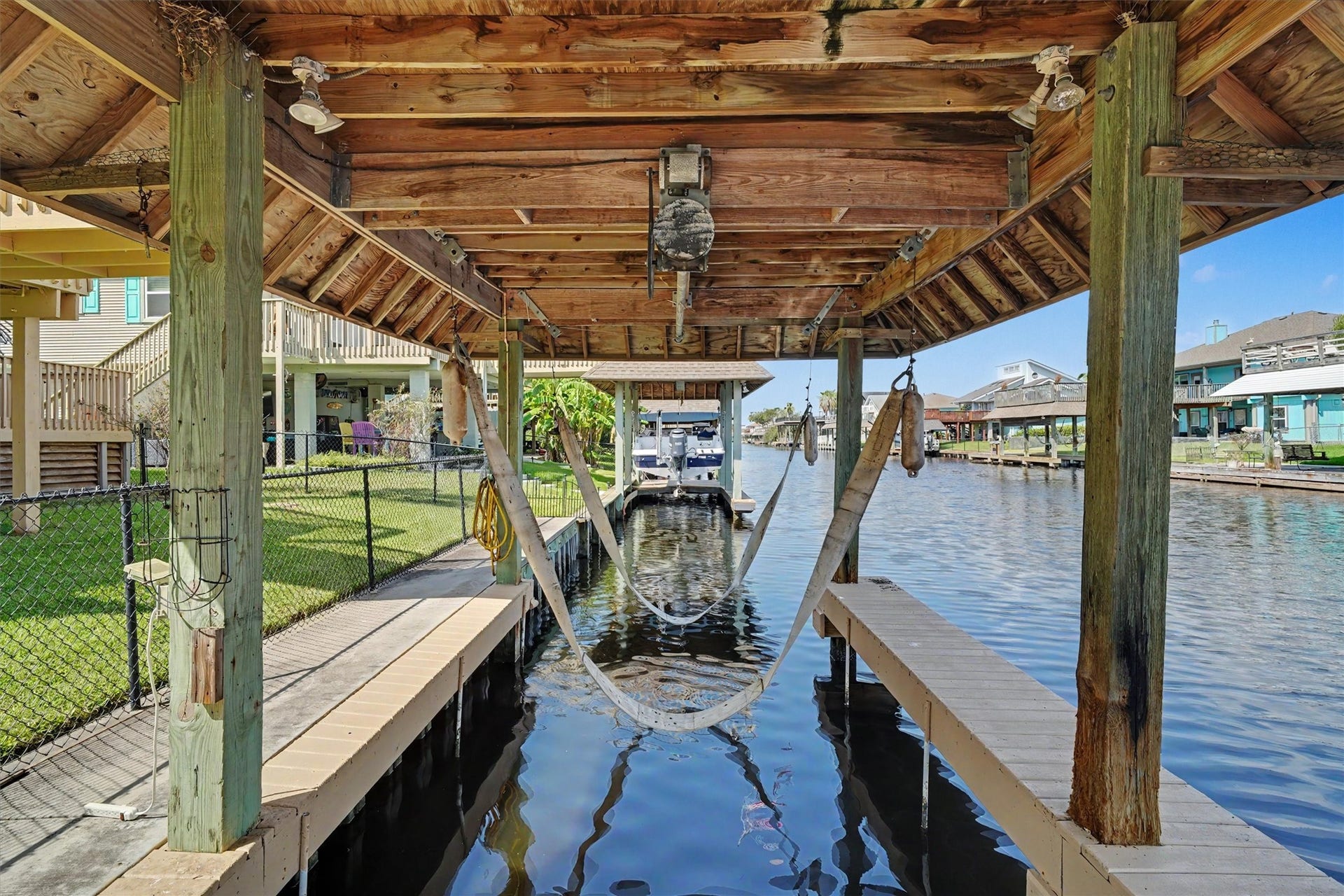 Boathouse with boatlift. Facing towards the lateral canal where the boating exit sits