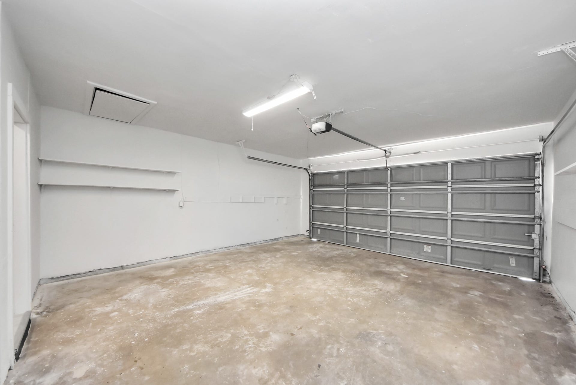 9610 Westview Drive, Houston, TX 77055 Generously sized garage offering ample room for vehicles, storage, hobbies, and everyday convenience.