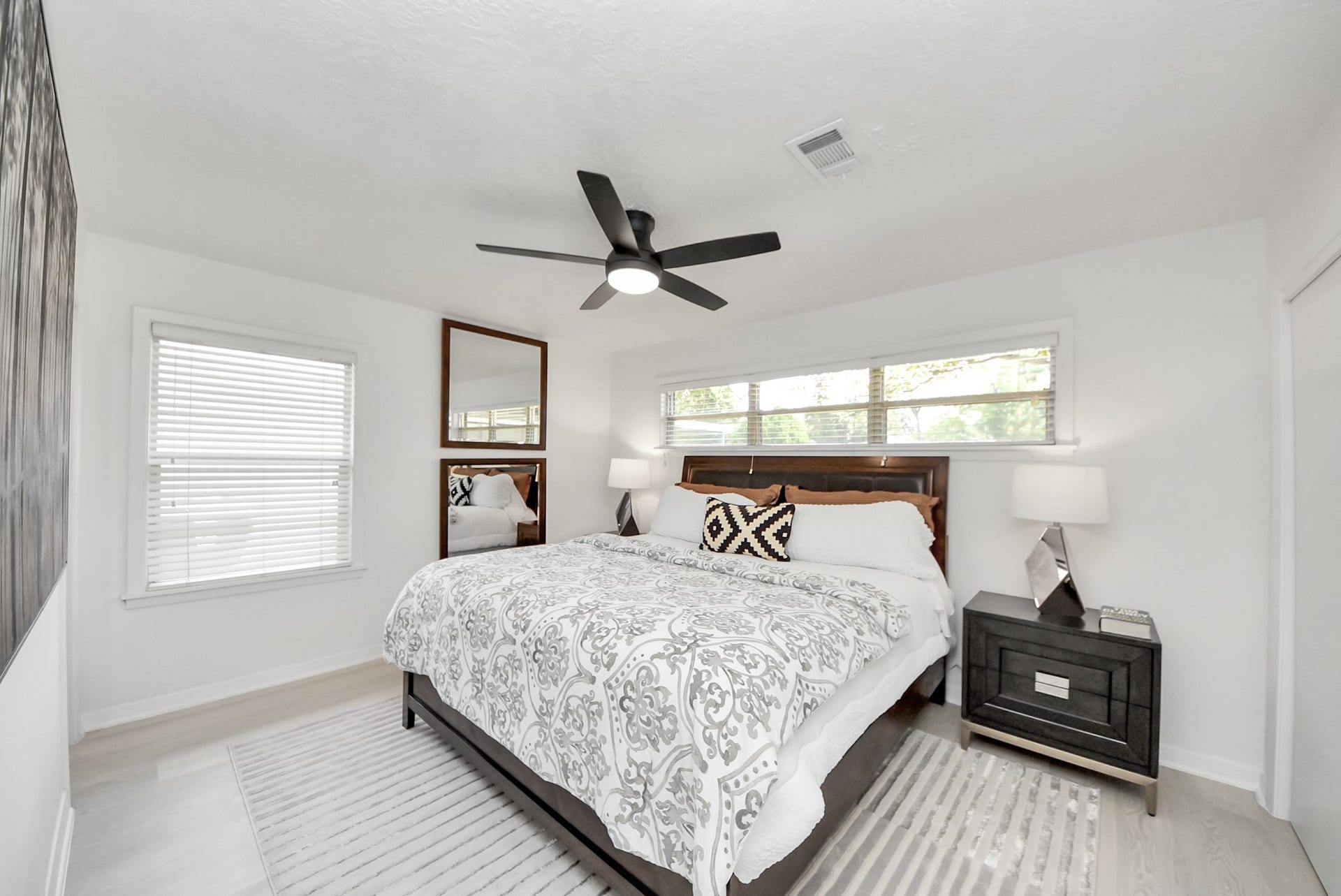 9610 Westview Drive, Houston, TX 77055 Bright and inviting bedroom with a comfortable layout, calming neutral tones, and abundant natural light creating a peaceful and relaxing atmosphere for everyday living.