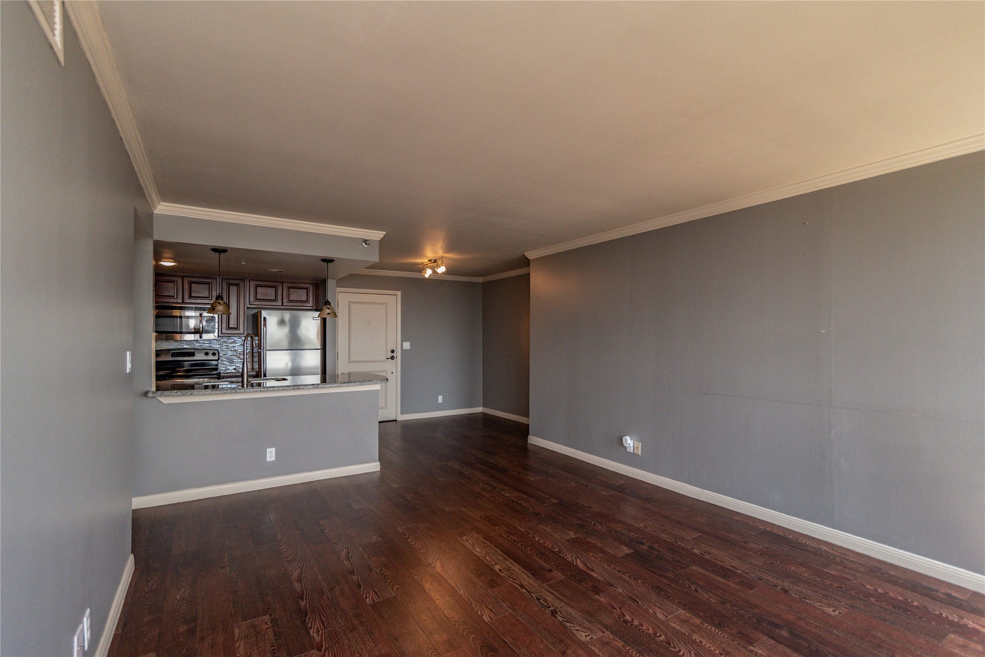 3525 Sage Road, #1402, Houston, TX 77056 Living space opens towards kitchen.