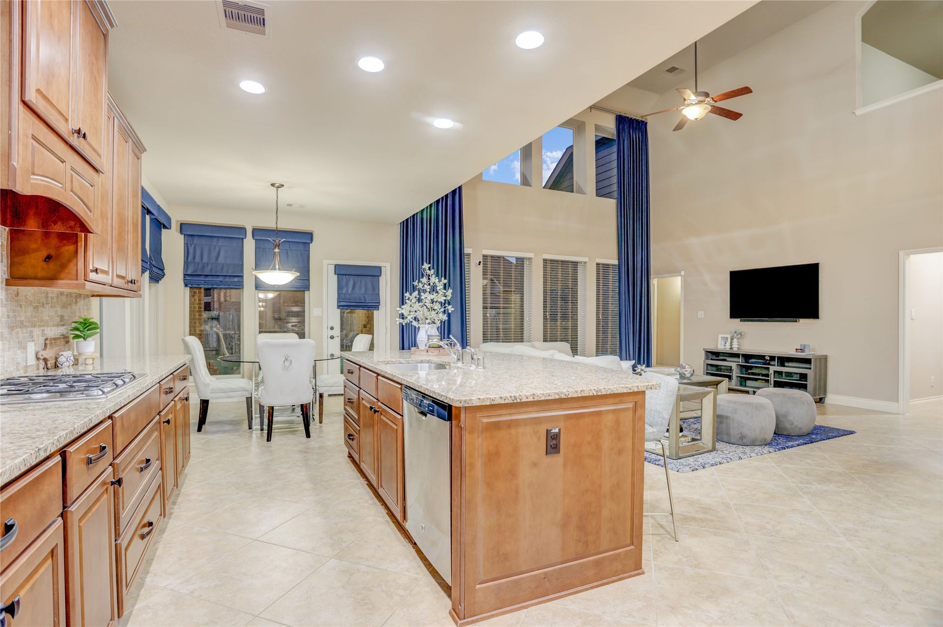 13308 Paxton Hill Court, Pearland, TX 77584 The open-concept design keeps everyone connected, with the kitchen overlooking the breakfast area and dramatic two-story family room. Whether you're preparing meals, helping with homework, or entertaining guests, this thoughtfully designed space is built for the way you live.