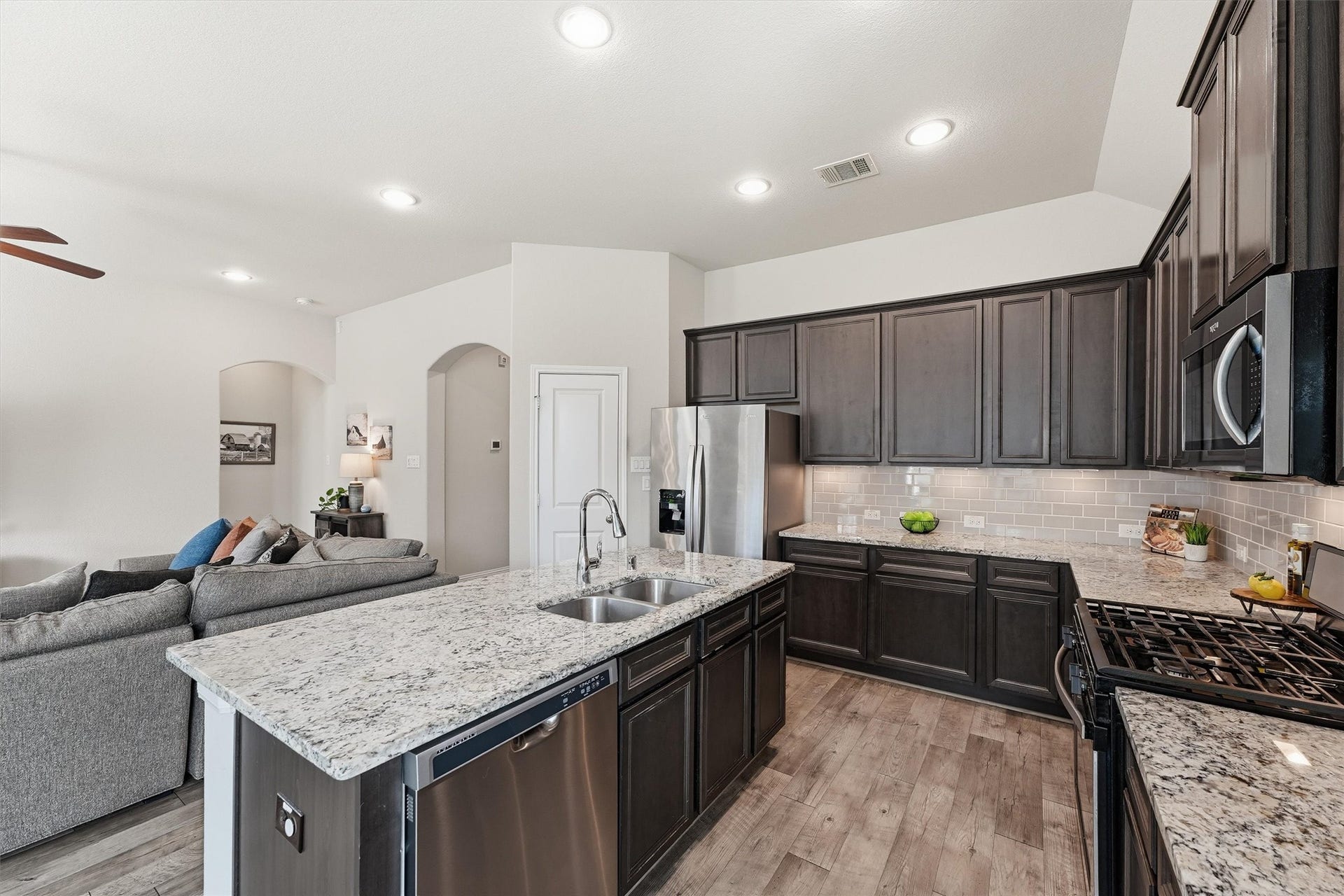 31549 Timber Grove Lane, Spring, TX 77386 Kitchen with 42" cabinets, generous storage and under-cabinet lighting.