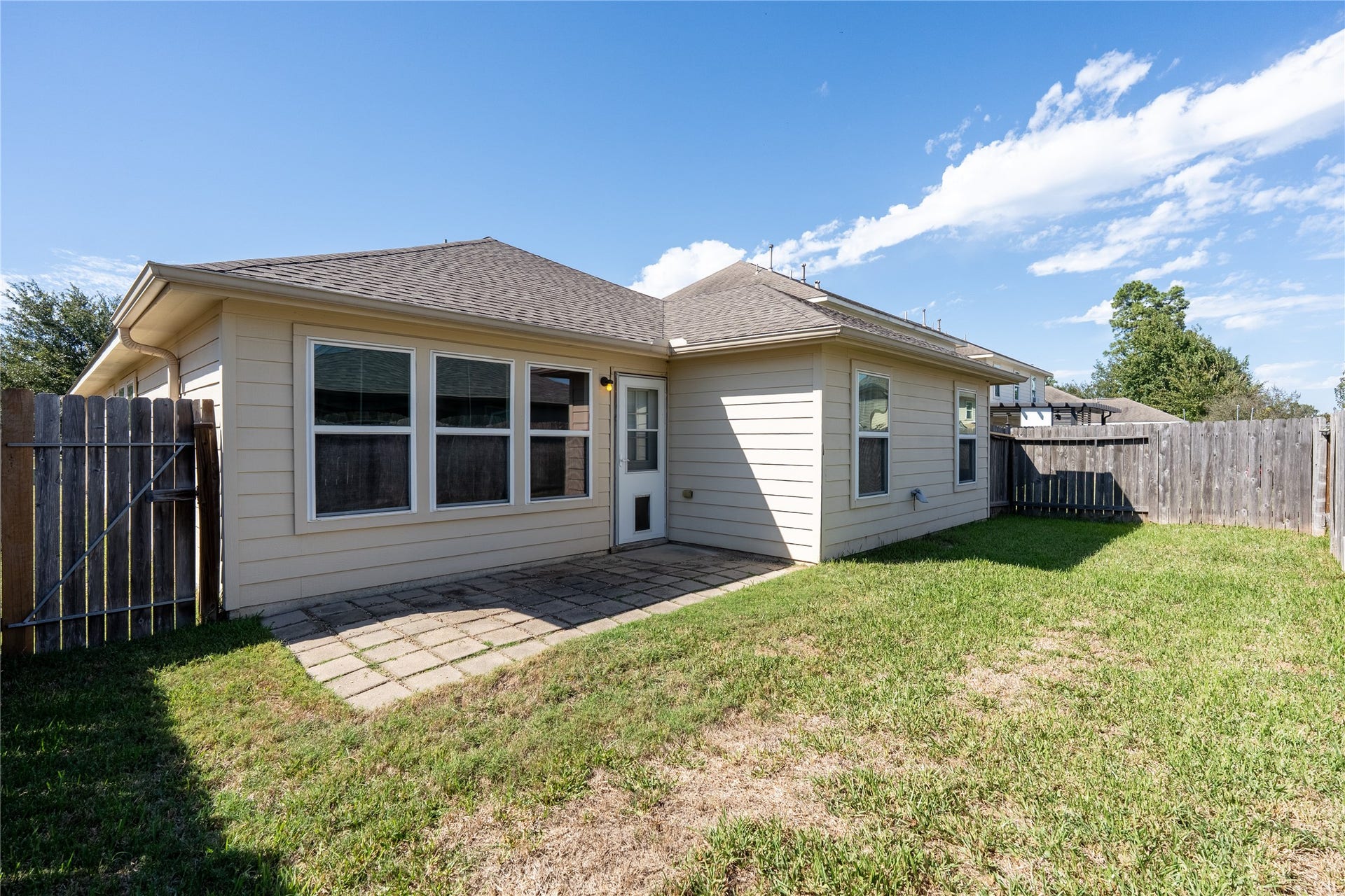 16815 Fallen Timbers Dr Drive, Conroe, TX 77385 Backyard + patio