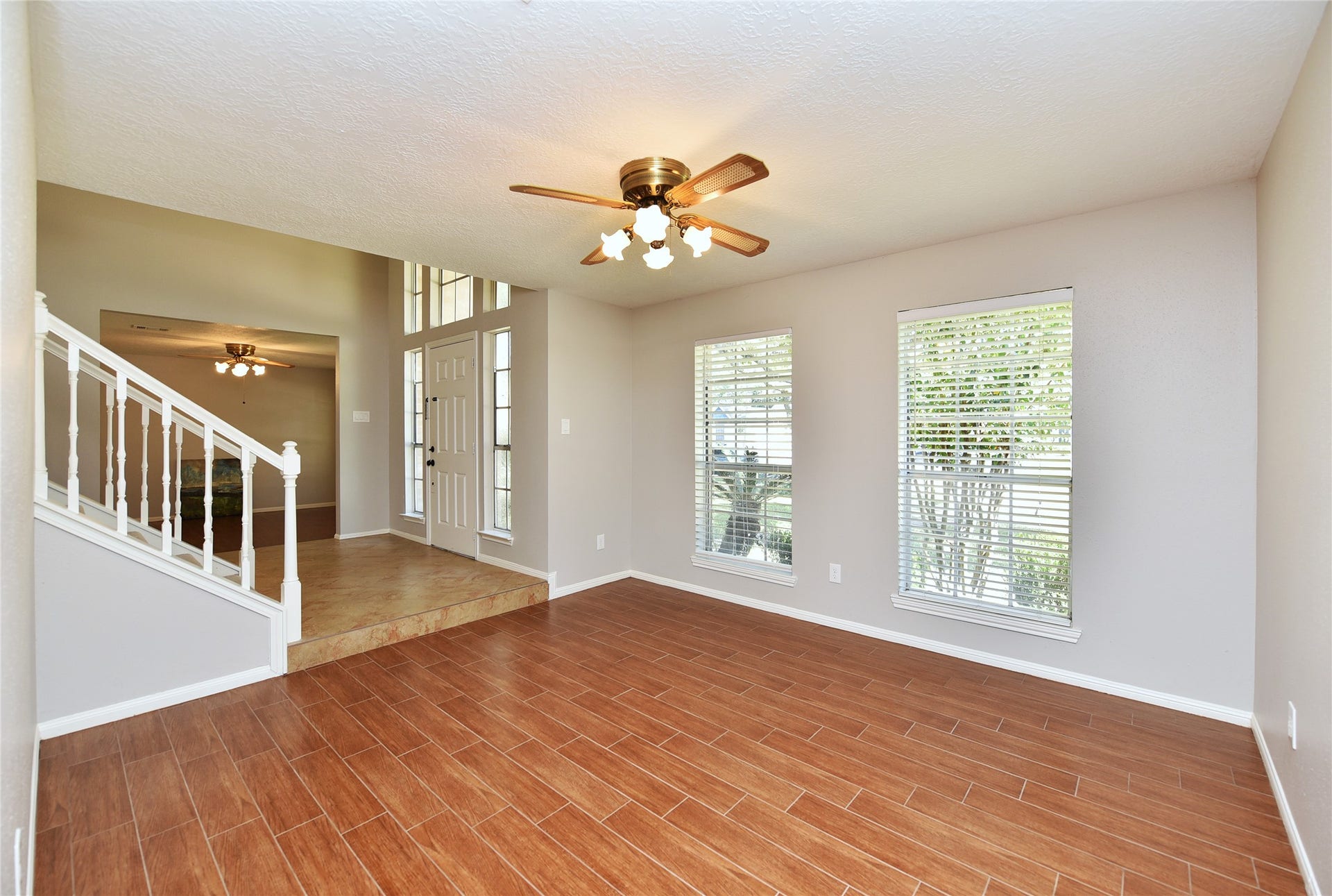 907 Sugarfield Court, Sugar Land, TX 77498 The spacious formal dining room offers ample space for hosting celebrations and gatherings.
