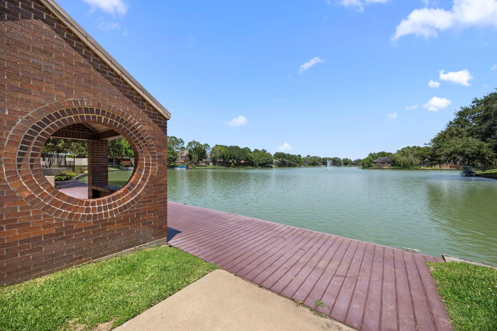 907 Sugarfield Court, Sugar Land, TX 77498 Enjoy Sugarmill lake next to pool and clubhouse.