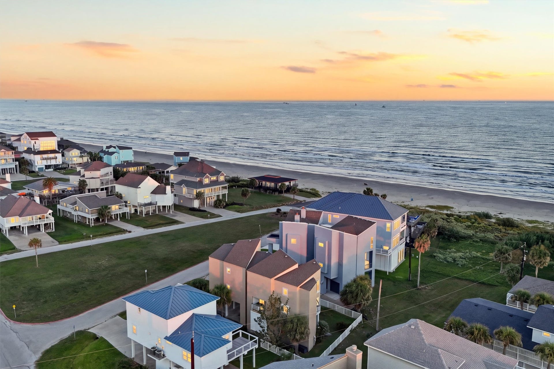4207 Barataria Court, Galveston, TX 77554 Imagine trading your daily routine for sandy strolls and rolling waves. This aerial perspective captures the homes close connection to the shore, where spontaneous beach days become part of everyday life.