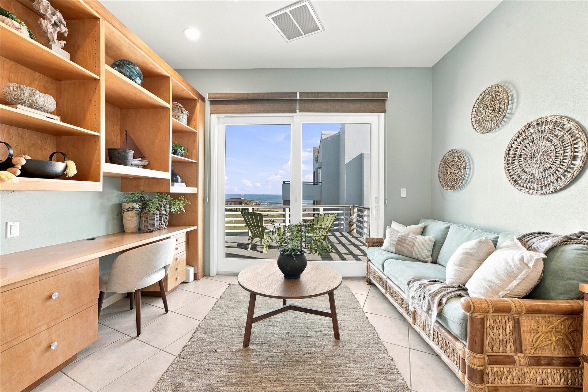4207 Barataria Court, Galveston, TX 77554 Finish a few emails, curl up with a favorite book, or step onto the balcony to watch the waves. With water views just beyond the glass, this inviting space makes even an ordinary afternoon feel like a getaway.